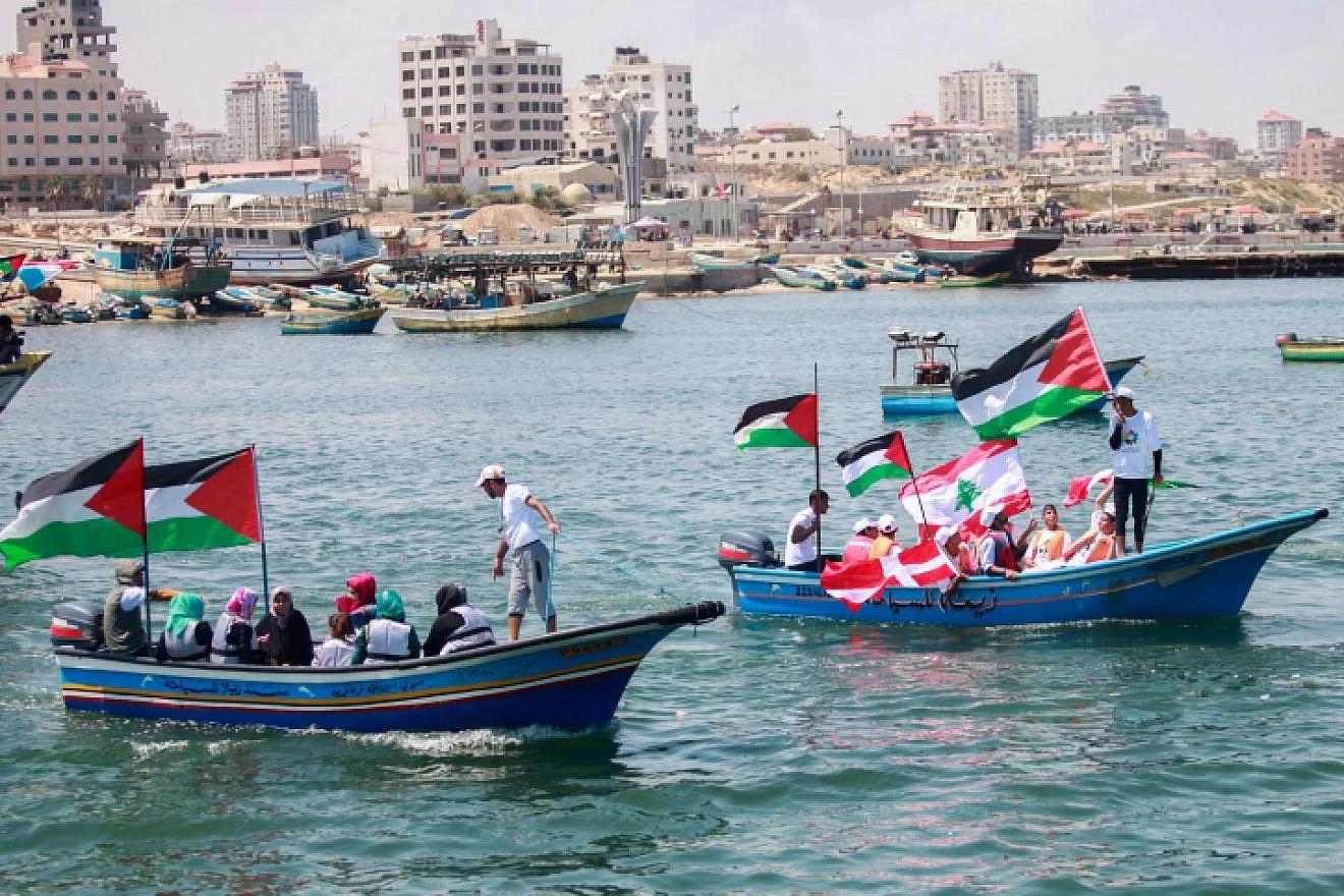 Gazans in boats off of Gaza port