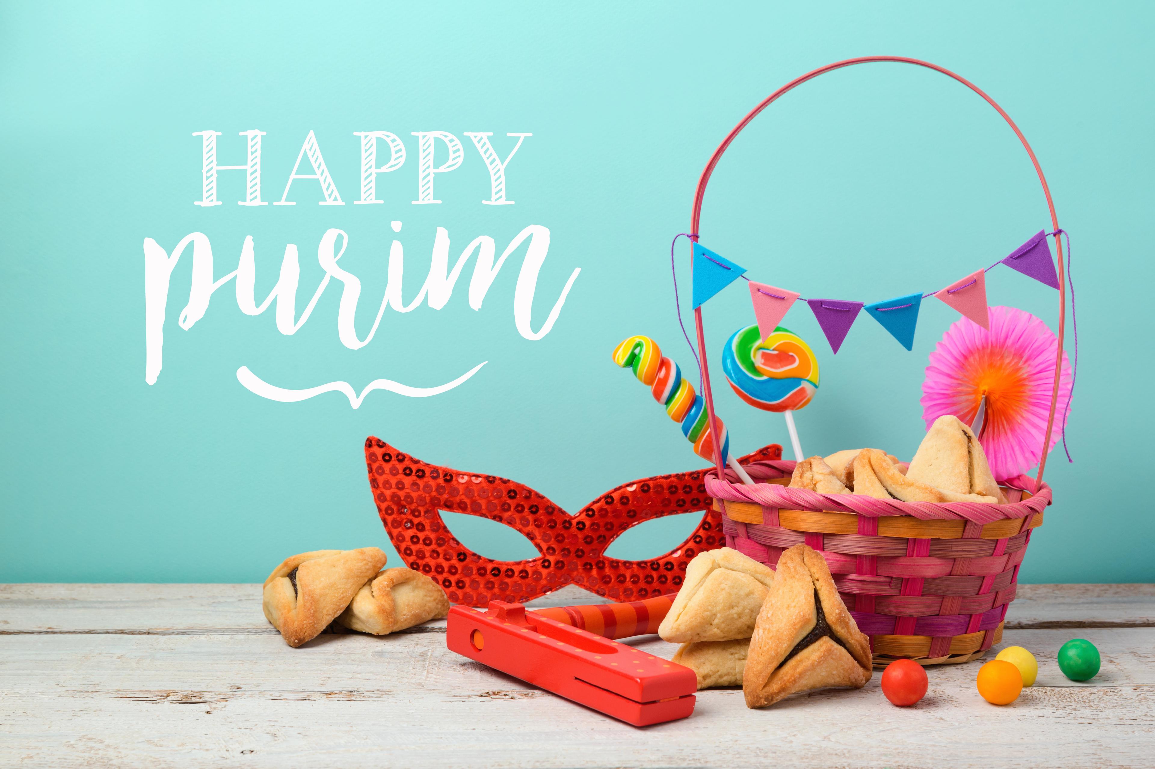 Purim holiday greeting card with hamantaschen cookies and carnival mask 