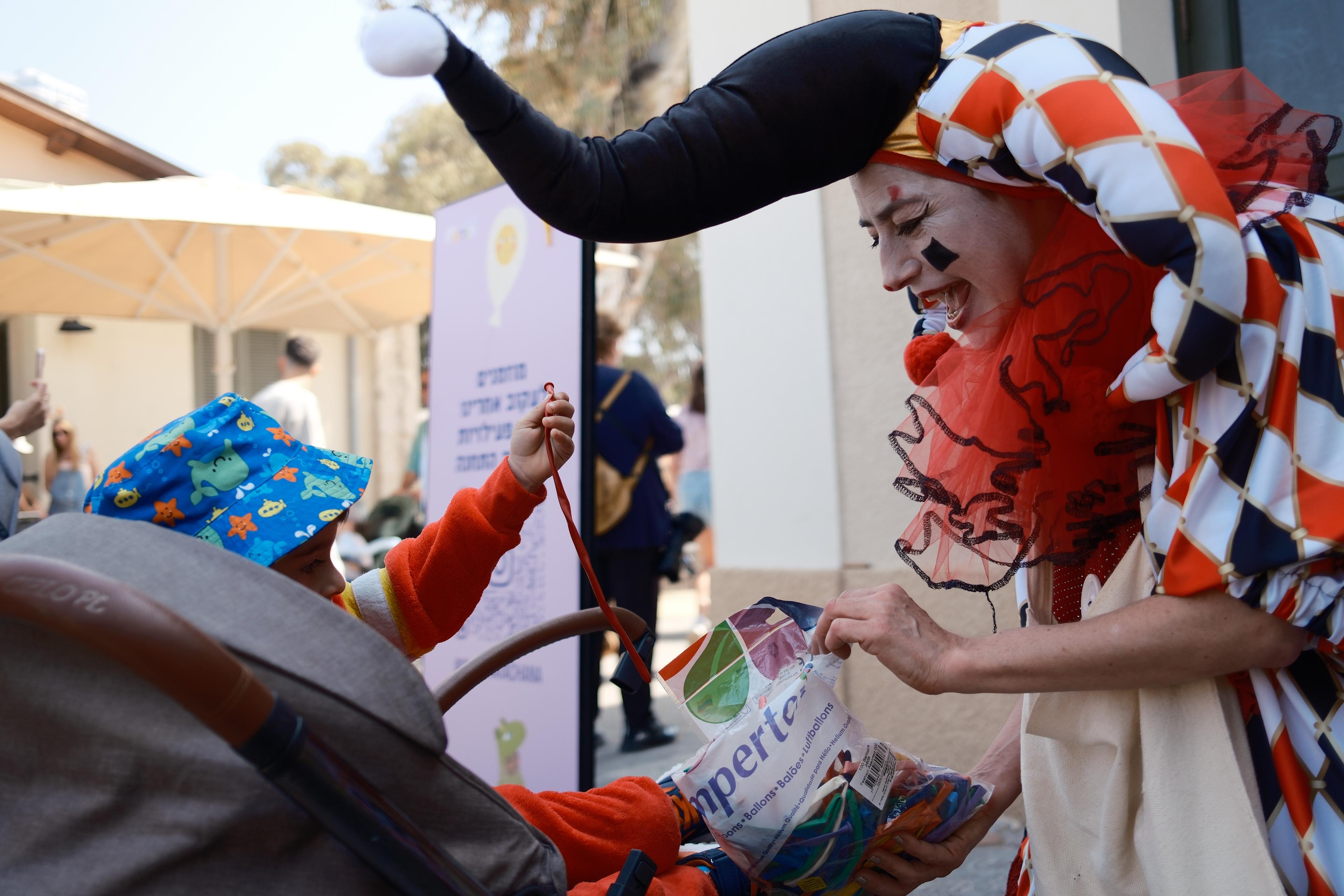 People wearing costumes celebrate the jewish holiday of Purim in Tel Aviv, March 15, 2025.