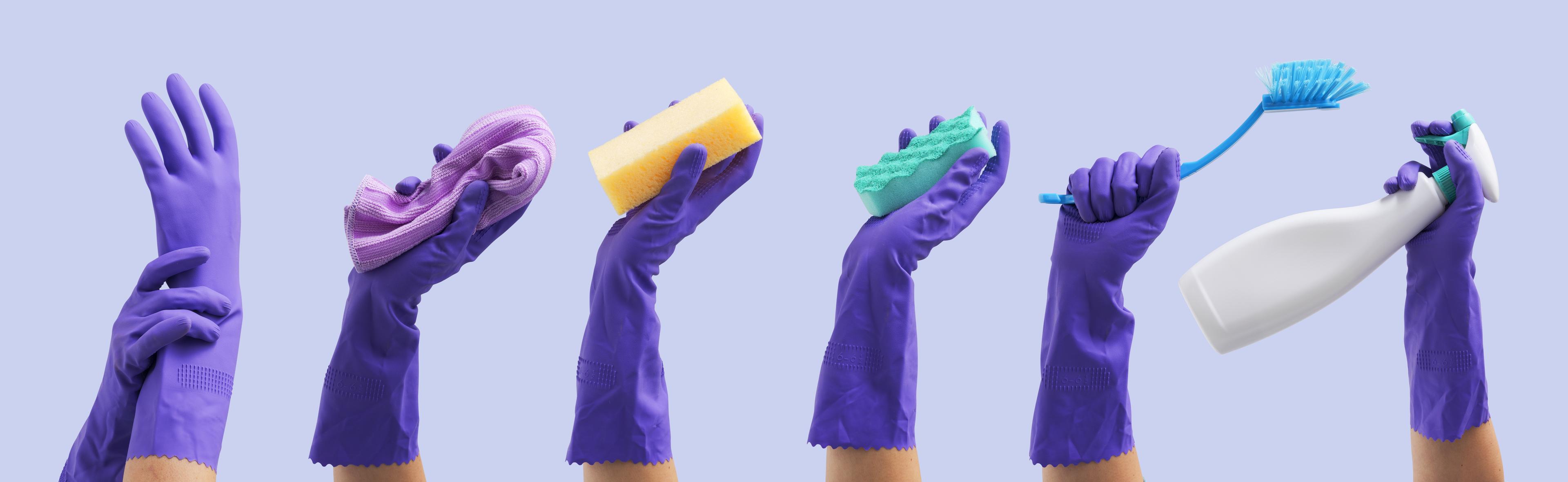Collection of female hands wearing protective rubber gloves and holding cleaning supplies, hygiene and housekeeping concept See less 