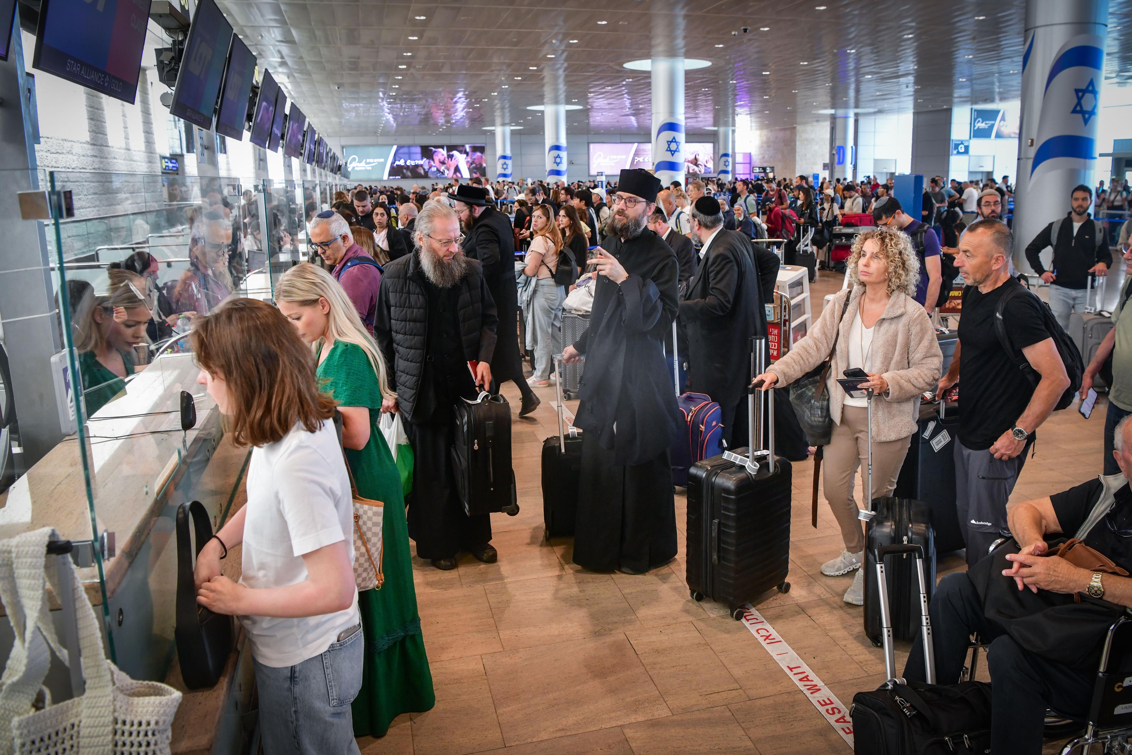 Passengers at the Ben Gurion International airport near Tel Aviv on May 4, 2025. 