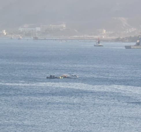 Capsized boat. Capsized boat.