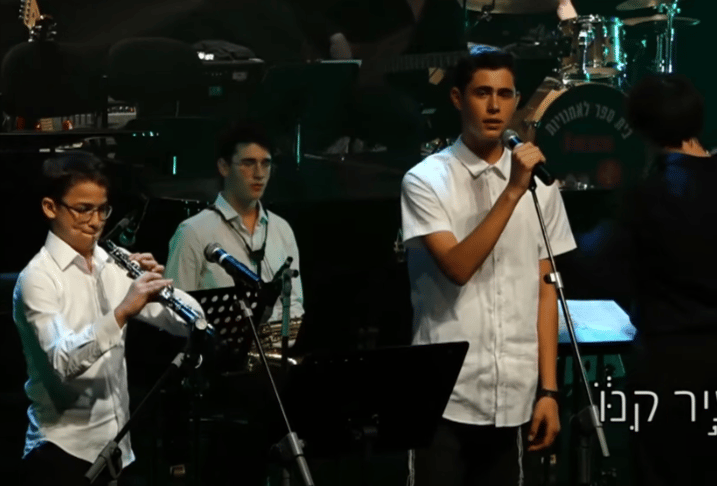 Sergeant Yishai Urbach z"l singing on the right