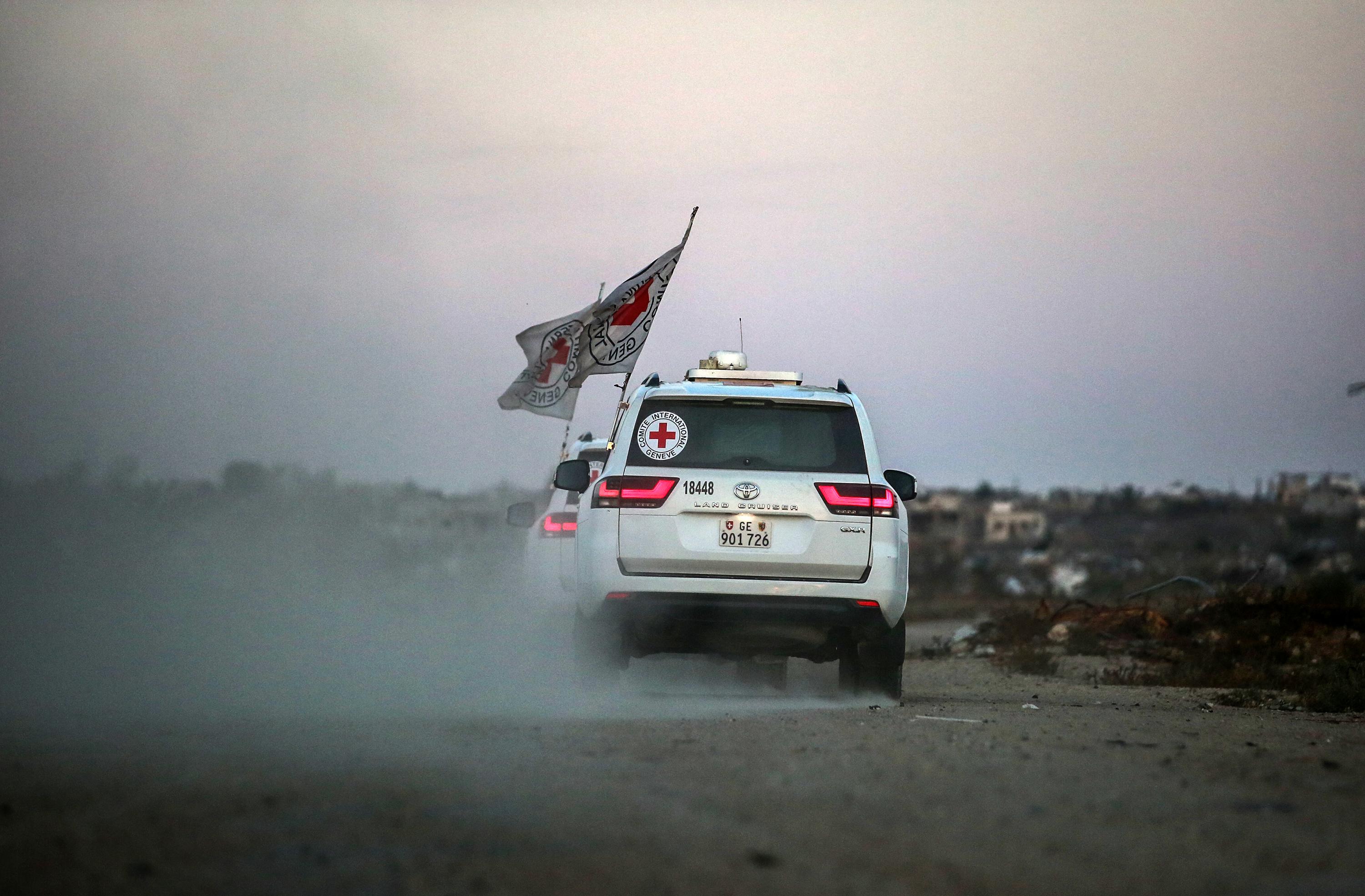 International Red Cross (ICRC) vehicles drive in Deir el-Balah, as they transports US-Israeli hostage Edan Alexander after being released from Hamas captivity on May 12, 2025.