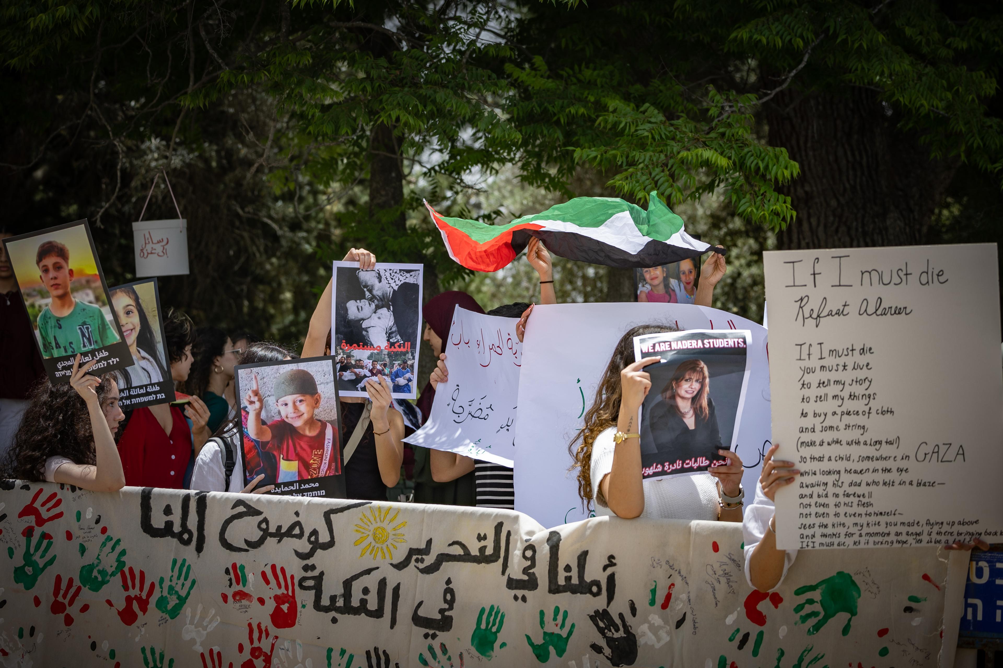 Demonstrators protest calling to end the war in Gaza while others demonstrate in favor of continuing the fighting, at the Hebrew University in Jerusalem on May 12, 2025. 
