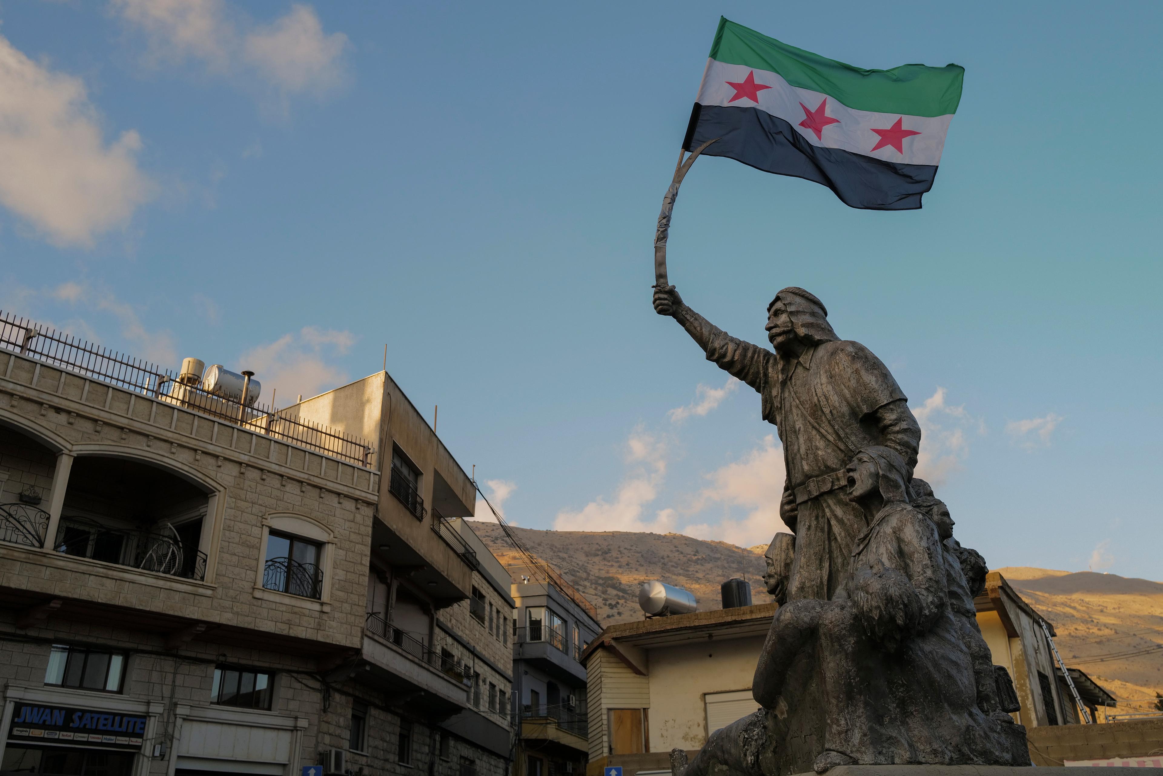 The Syrian opposition flag in Majdal Shams, in the Golan Heights, December 8, 2024. The Syrian opposition flag in Majdal Shams, in the Golan Heights, December 8, 2024.