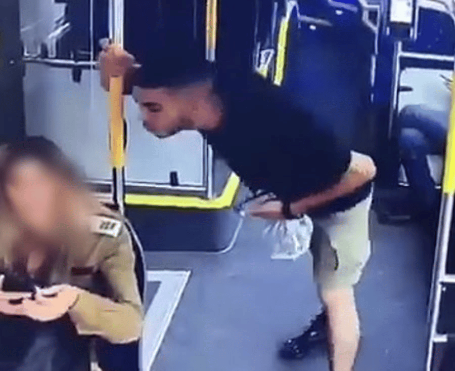 Man spitting on an IDF lieutenant colonel Man spitting on an IDF lieutenant colonel