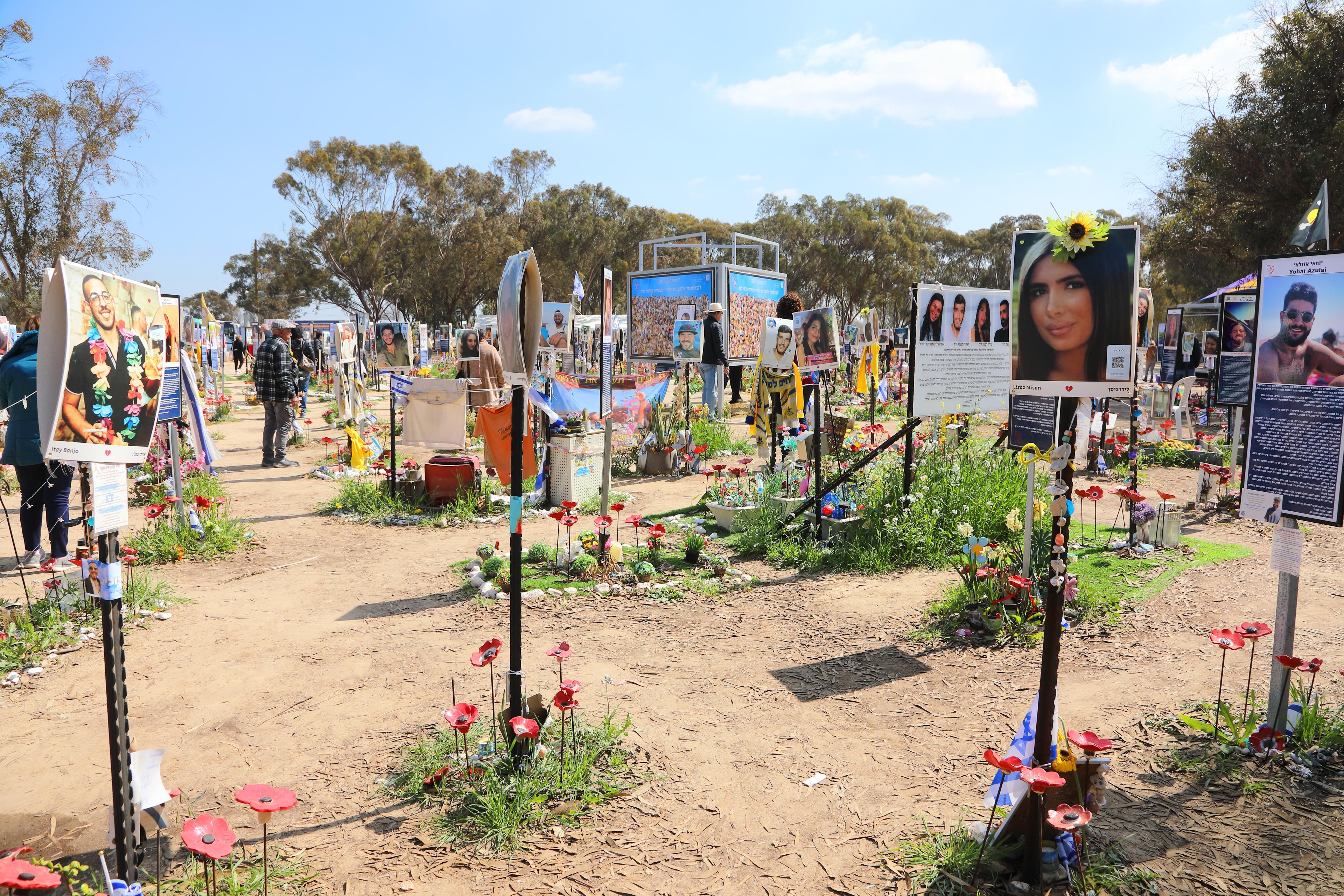 Memorial composed of photos of young Israelis killed during the terrorist attack on the NOVA Festival which took place on October 7, 2023 a few kilometers from Gaza Memorial composed of photos of young Israelis killed during the terrorist attack on the NOVA Festival which took place on October 7, 2023 a few kilometers from Gaza