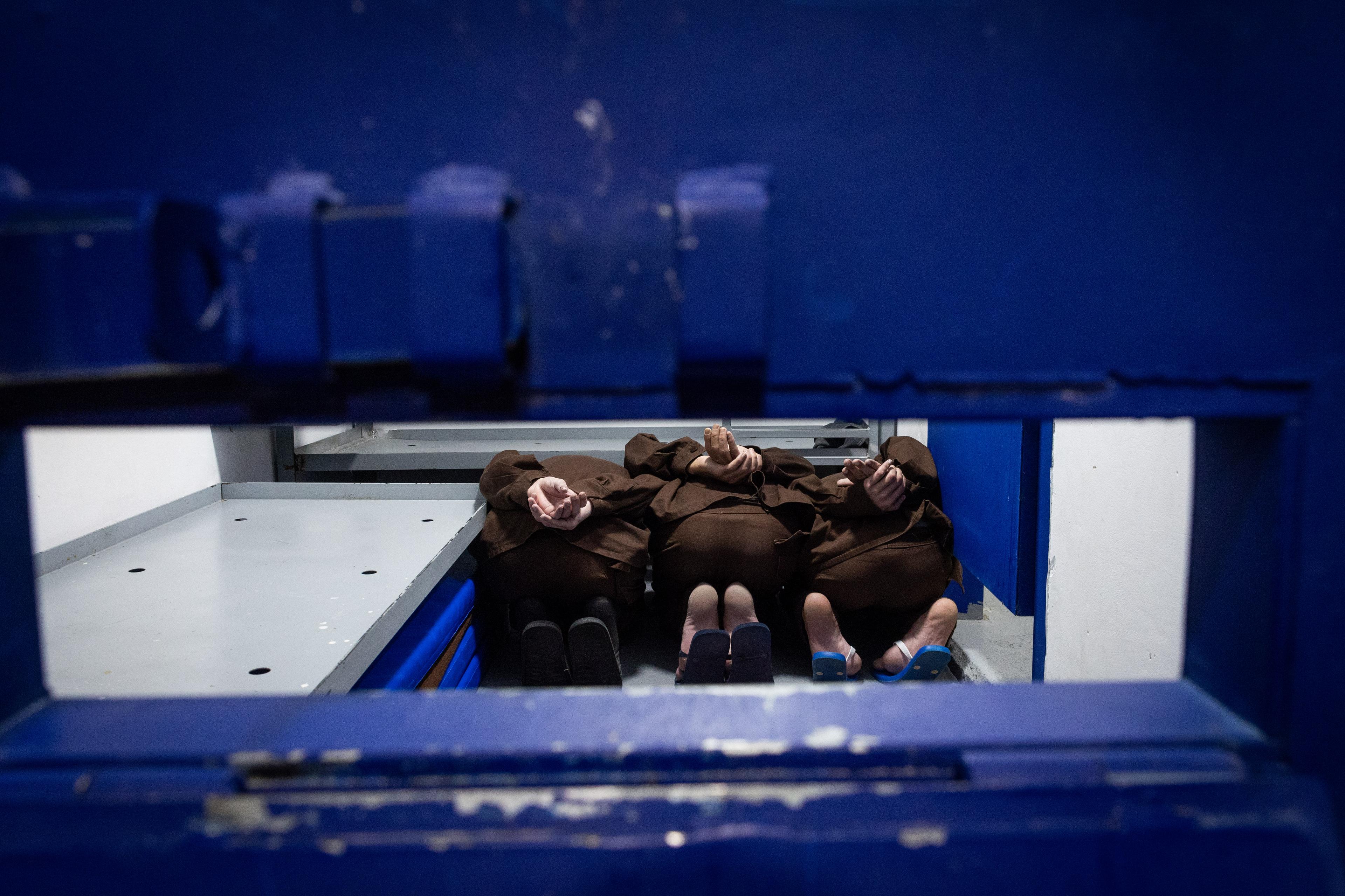 Hamas Nukhba Battalion terrorists who were captured on October 7th massacre seen in a jail cell at a prison in central Israel, where high risk Hamas and Hezbollah prisoners captured in recent war are being held, March 4, 2025.