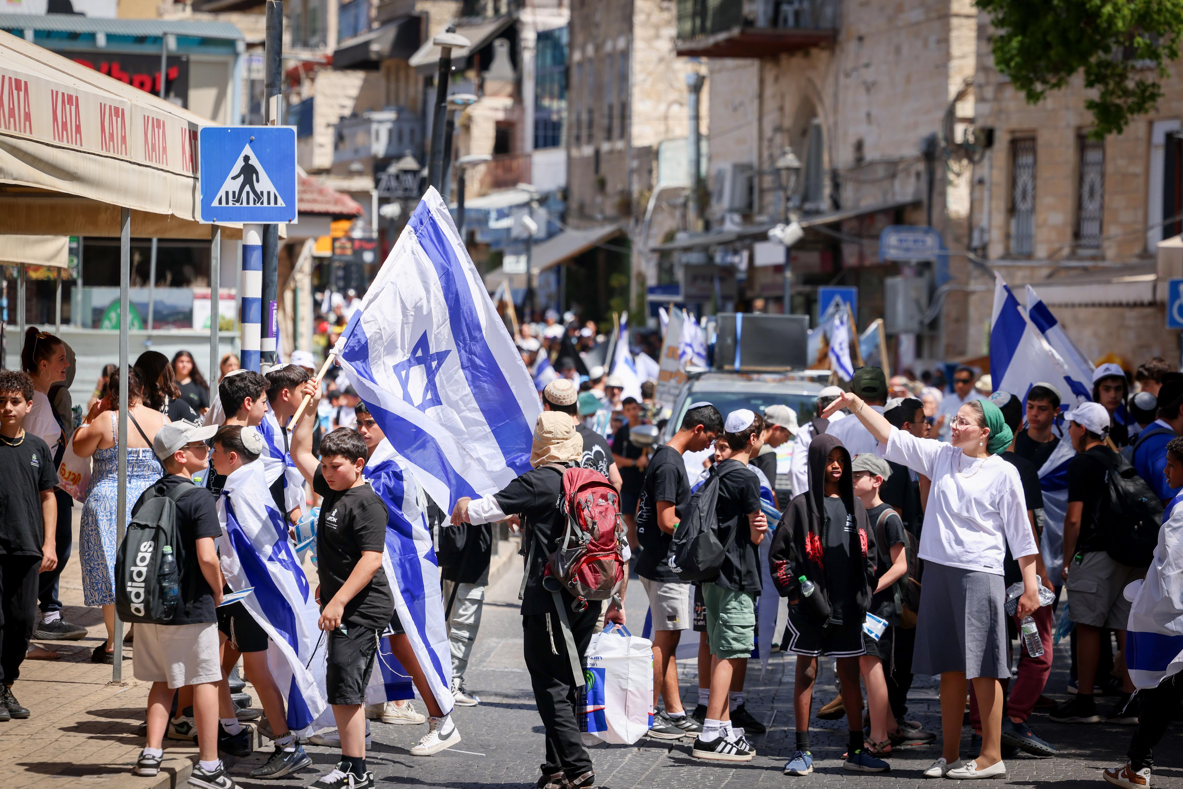Orthodox Jews attend a Jerusalem Day march in the Northern Israeli day of Tzfat. May 26, 2025. 
