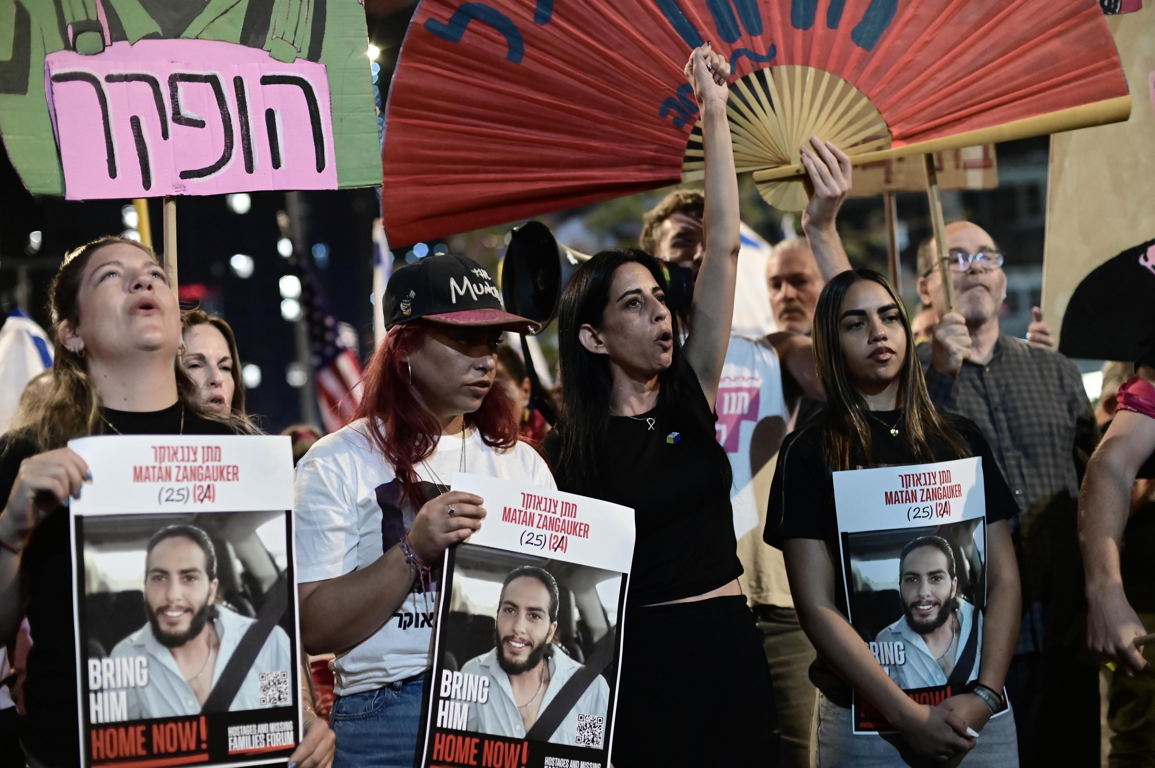 Demonstrators protest against the Israeli government and for the release of Israelis held hostage in the Gaza Strip outside Hakirya Base in Tel Aviv, May 24, 2025.