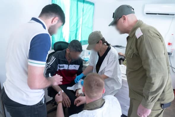 IDF treating civilians in Syria IDF treating civilians in Syria