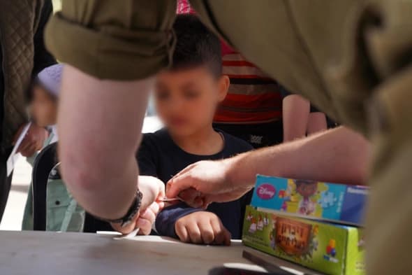 IDF treating civilians in Syria IDF treating civilians in Syria