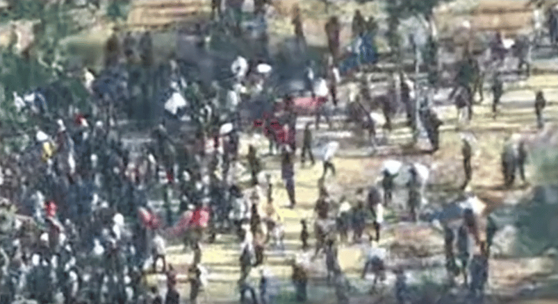Hamas firing on civilians seeking food.