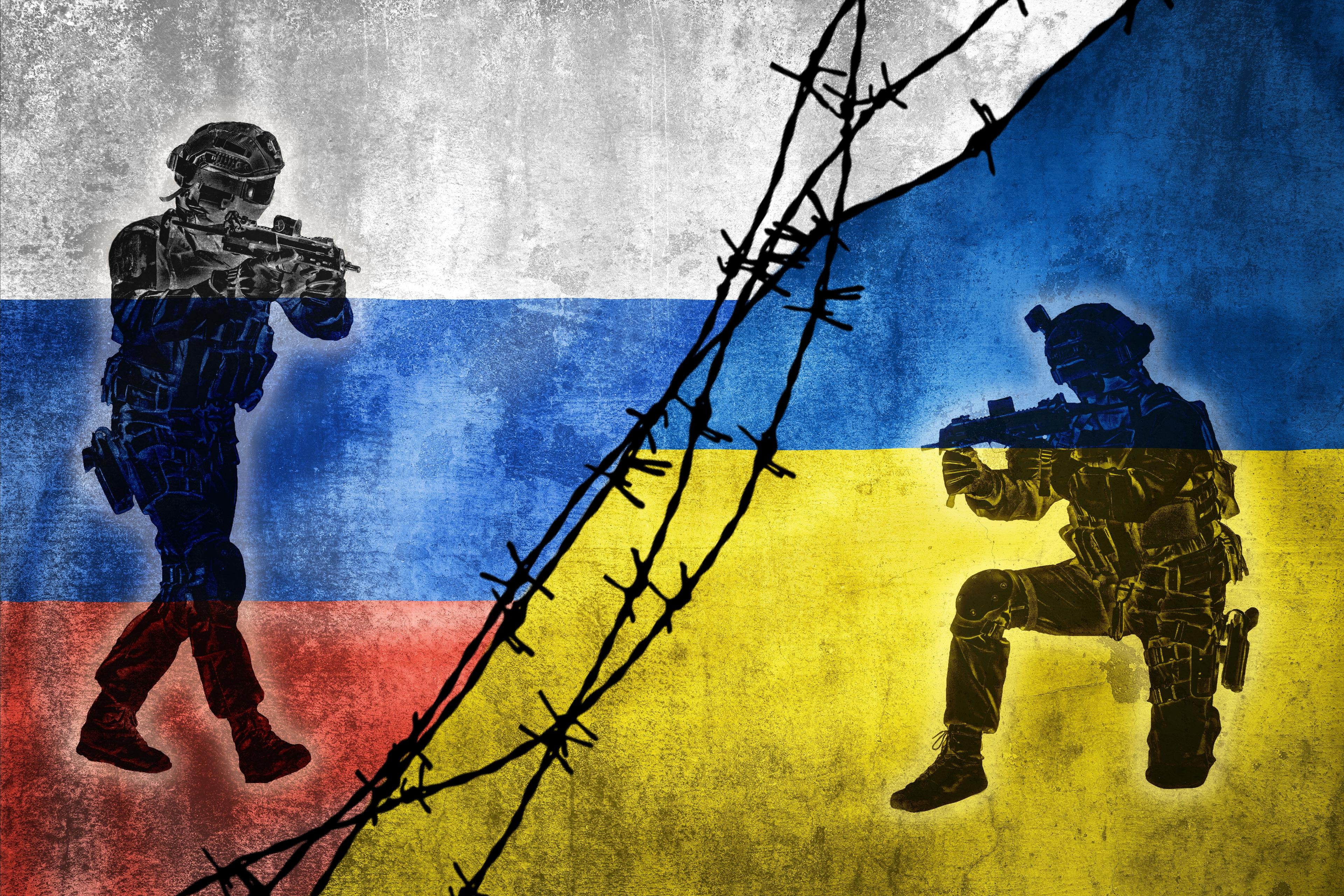 Grunge flags of Russian Federation and Ukraine divided by barb wire  