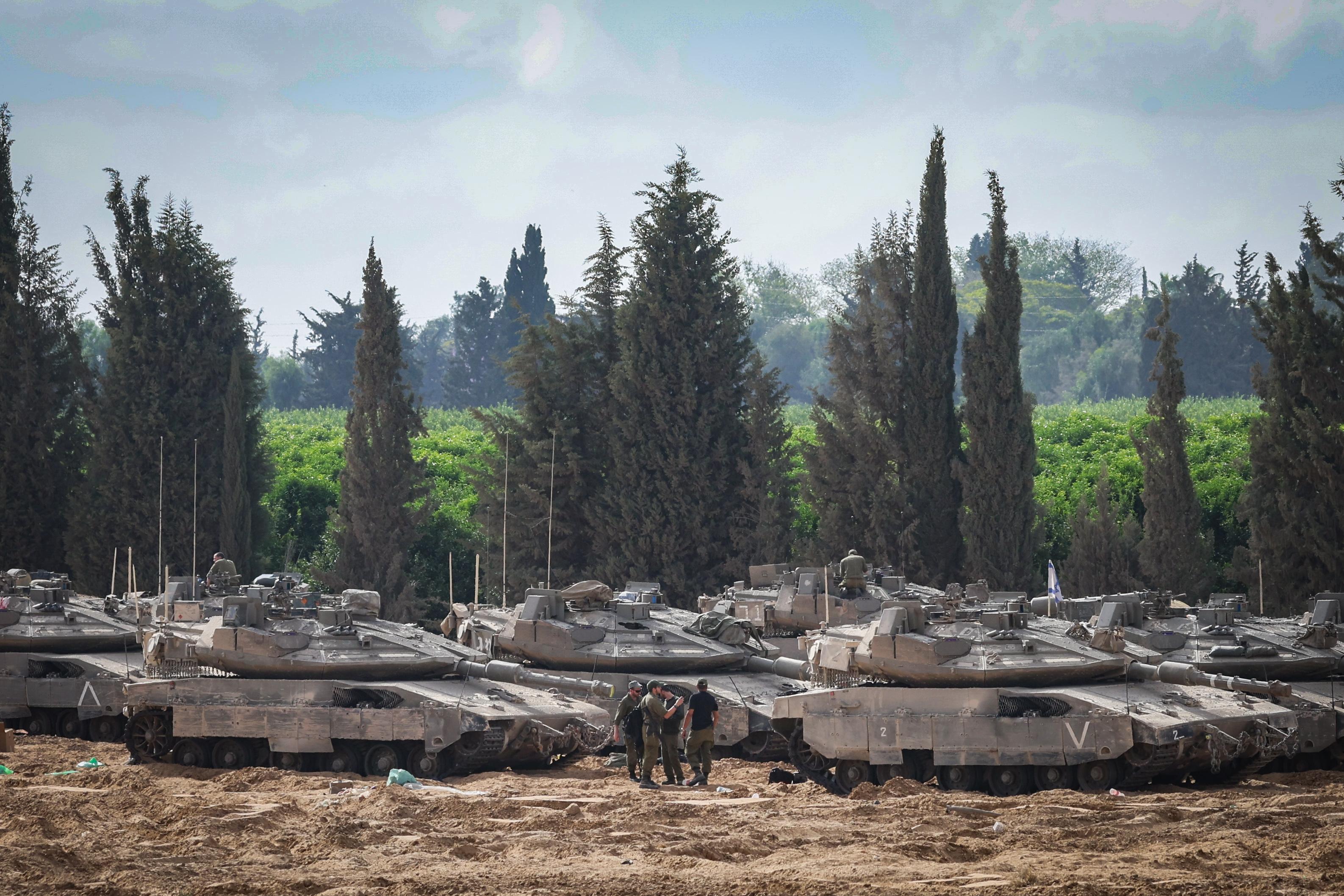Israeli soldiers at a staging area near the Israeli-Gaza border, southern Israel, May 19, 2025. Israeli soldiers at a staging area near the Israeli-Gaza border, southern Israel, May 19, 2025.