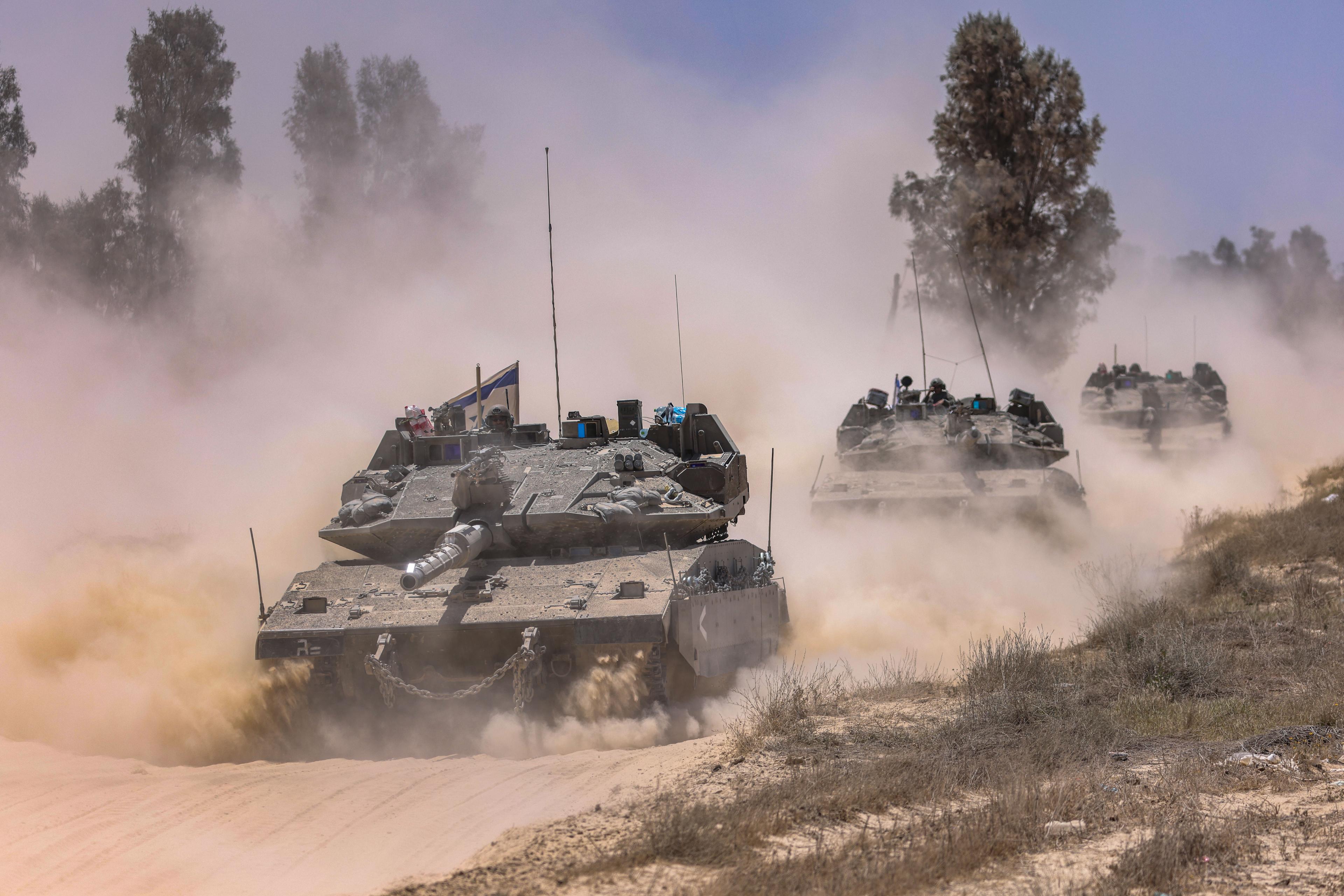 Israeli tanks seen on the Israeli border with the Gaza Strip, southern Israel, May 20, 2025. Israeli tanks seen on the Israeli border with the Gaza Strip, southern Israel, May 20, 2025.