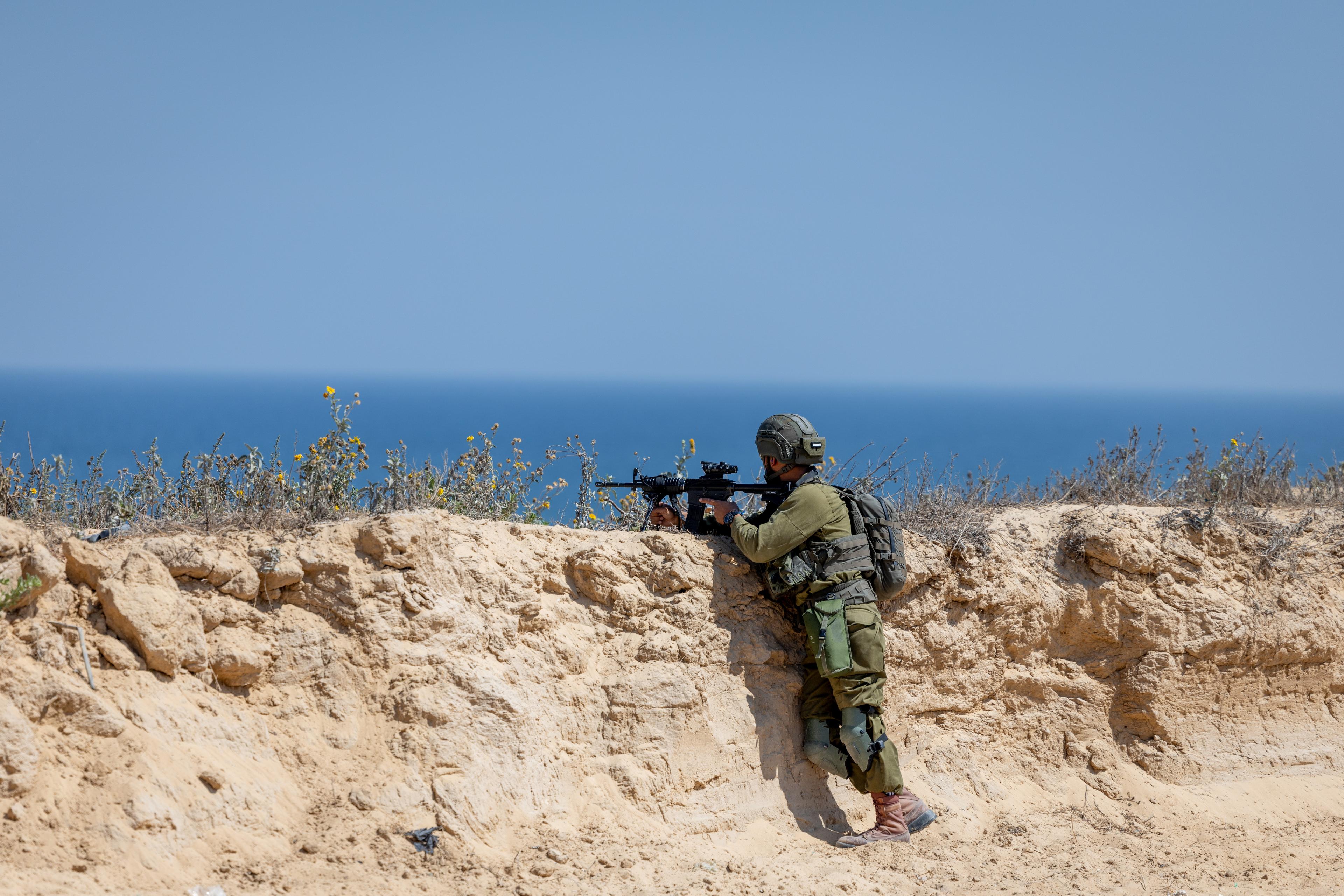 Ultra orthodox Jewish reserve soldiers of the IDF's Hasmonean Brigade operate in the Gaza Strip on June 26, 2025. The Hasmonean Brigade is the Israel Defense Forces' new Haredi (ultra orthodox) brigade. 