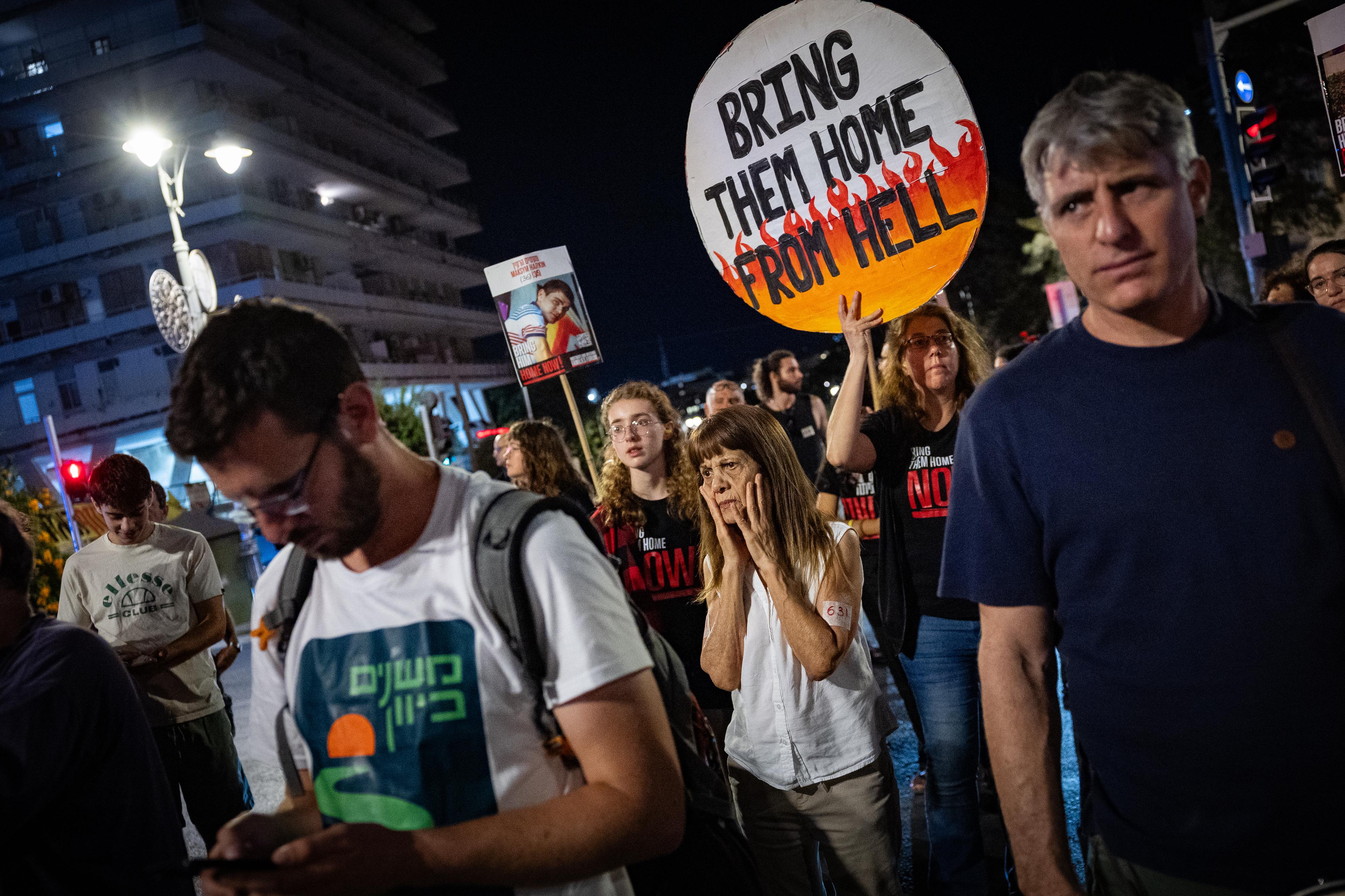 People protest calling for the release of hostages held in the Gaza Strip, outside the Prime Minister's residence in Jerusalem, June 28, 2025.