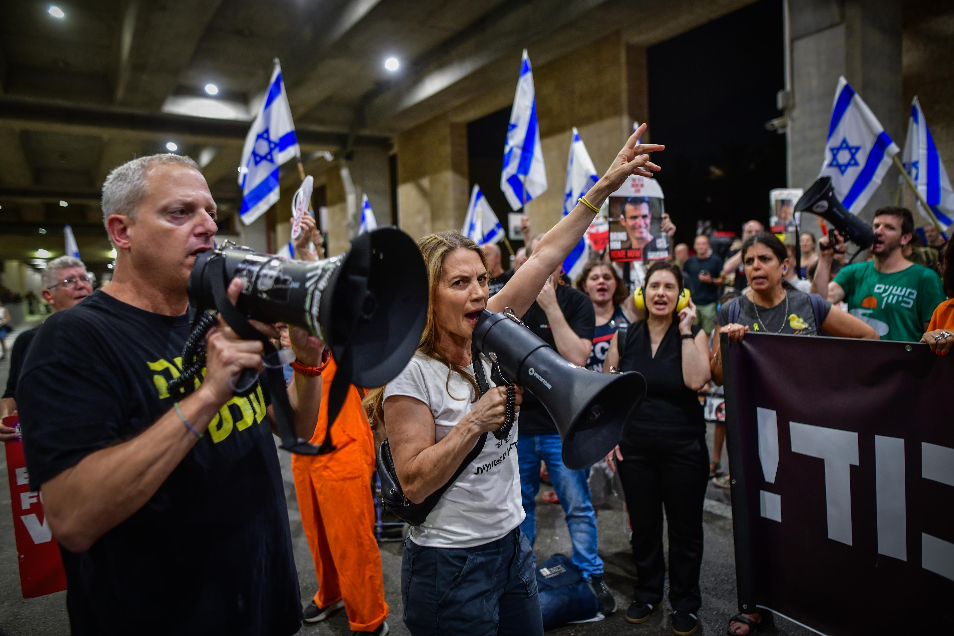 Protesters demonstrate against Netanyahu and call for the release of hostages held in Gaza, at Ben Gurion Airport near Tel Aviv, ahead of Netanyahu’s departure to the UN General Assembly in New York, September 24, 2025. 