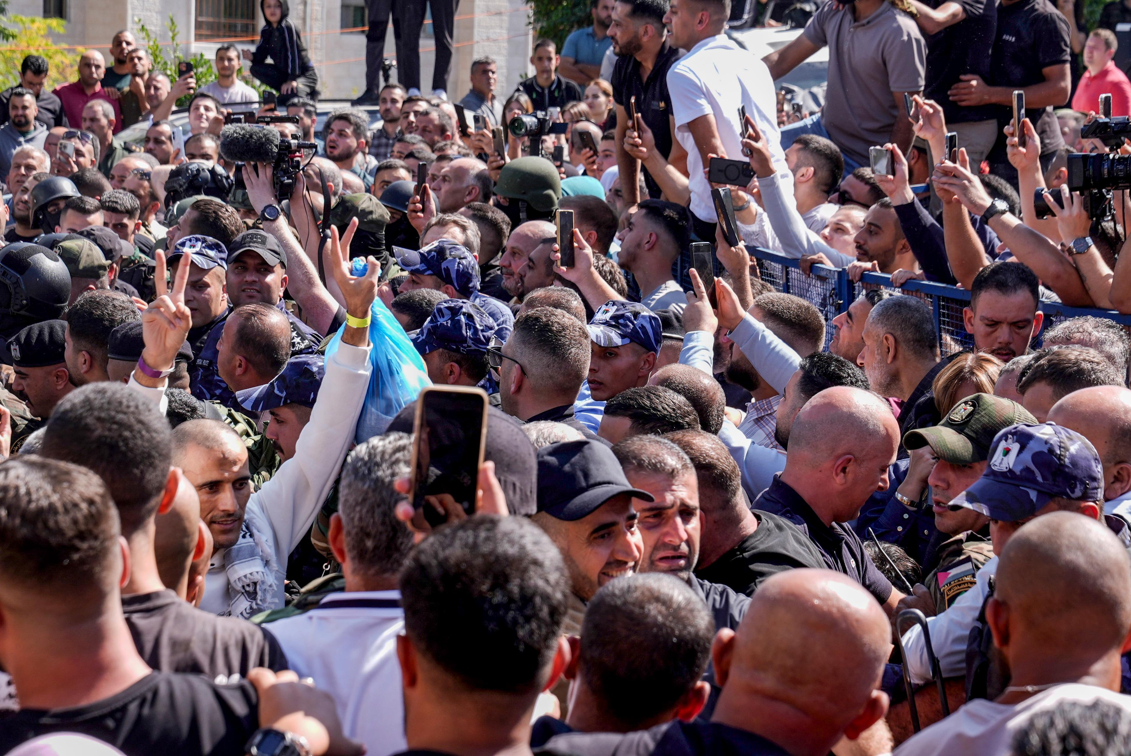 Palestinian prisoners who were released in a hostage deal between Israel and Hamas arrive in the city of Ramallah, October 13, 2025. 