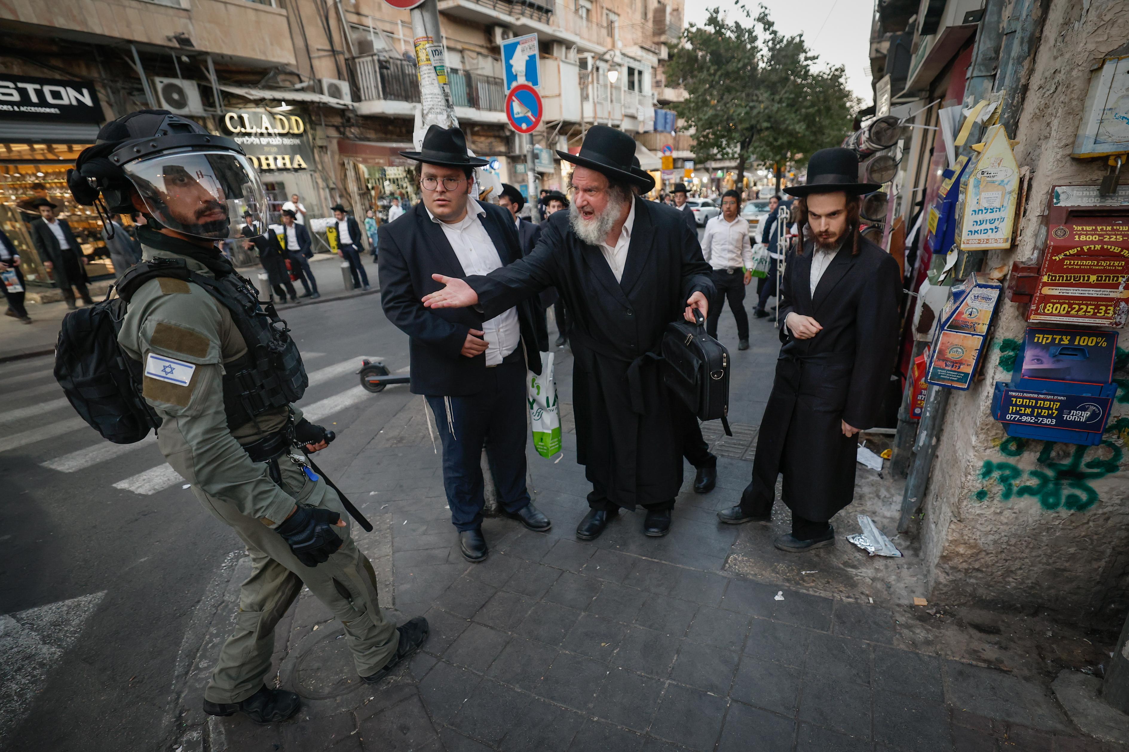 Ultra Orthodox Jewish men attend a protest against the jailing of Jewish seminary students who failed to comply with an army recruitment in Meah Shearim. October 22, 2025