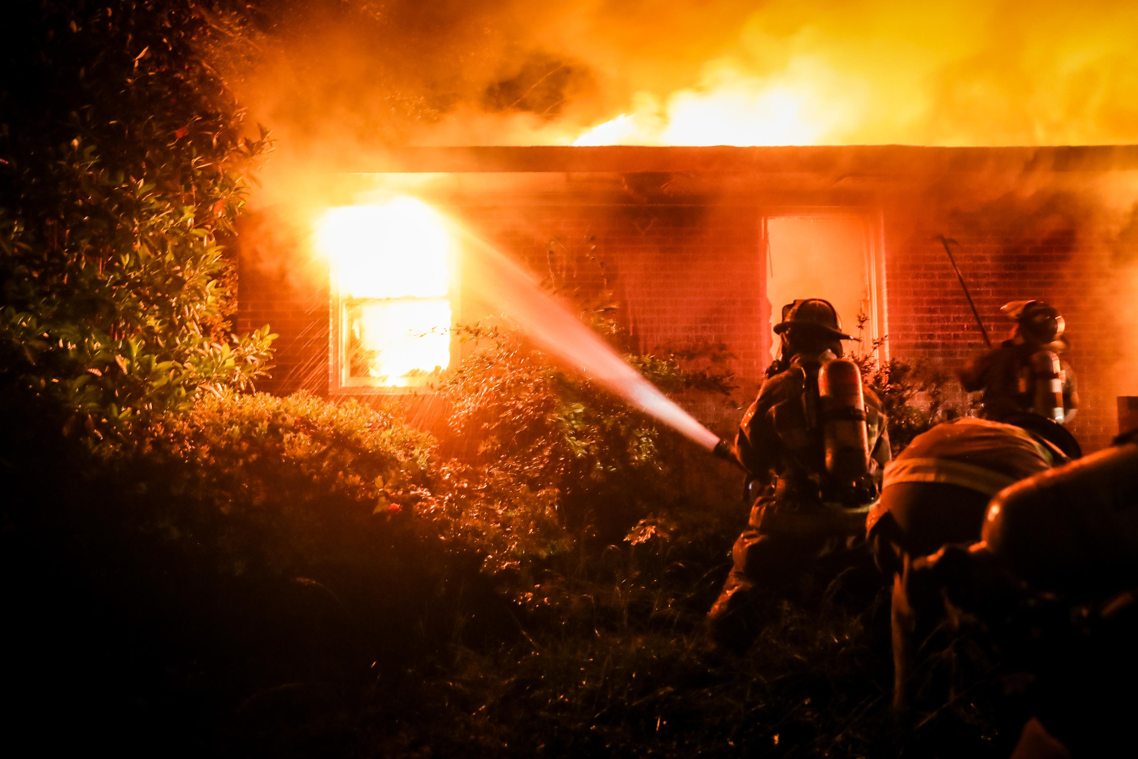 Illustrative: Firefighters extinguish a fire