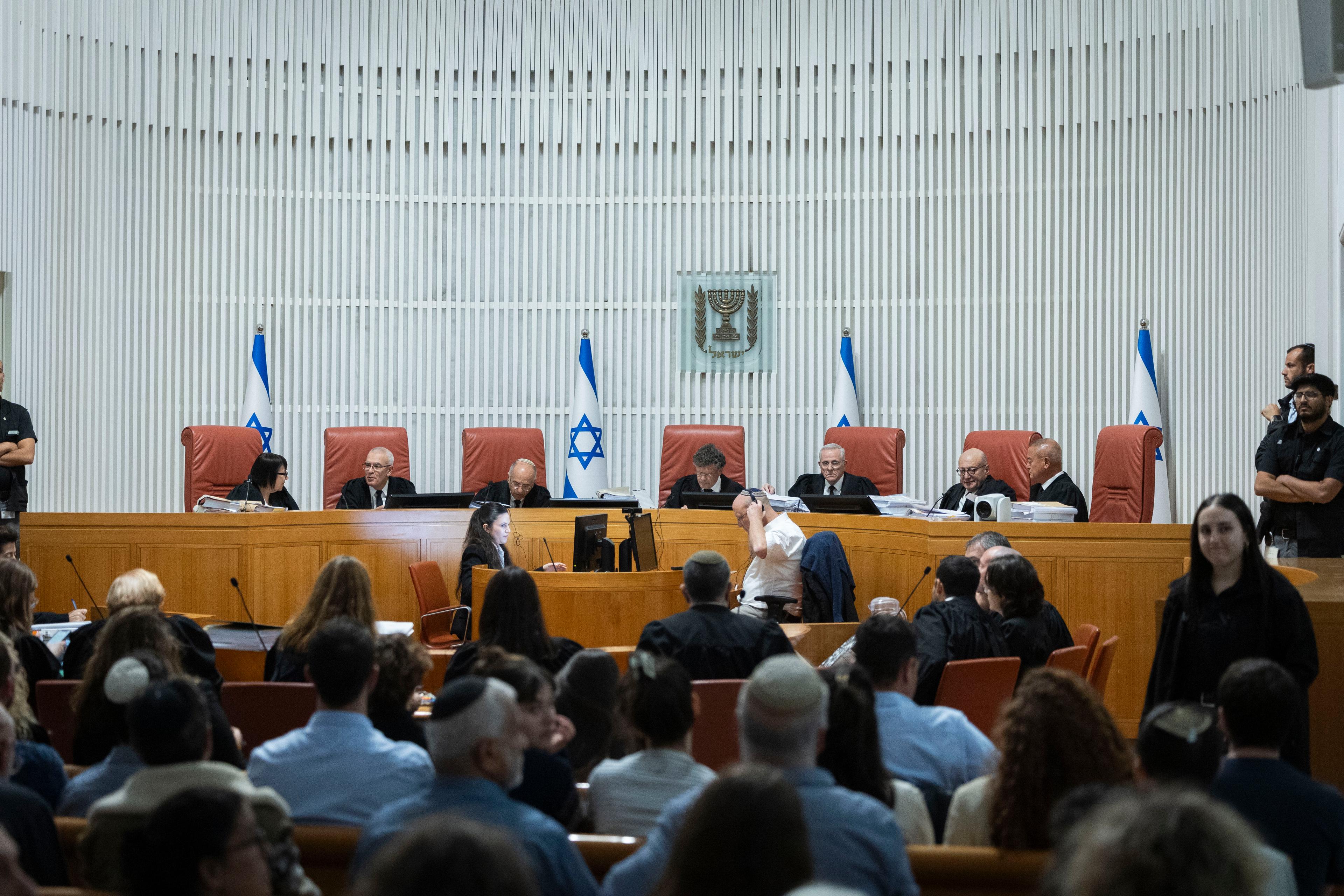 Supreme Court President Isaac Amit and Supreme Court justices arrive for a hearing on petitions against the government’s dismissal of Attorney General Gali Baharav-Miara, at the Supreme Court in Jerusalem, December 1, 2025.