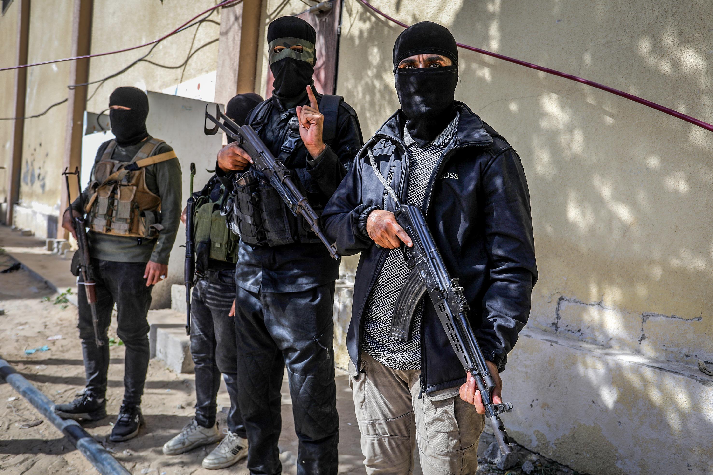 Masked members of the Palestinian Hamas movement arrest several members of Yasser Abu Shabab, who are accused of collaborating with the Israeli army in the Gaza Strip, according to Hamas members, in the southern Gaza Strip.