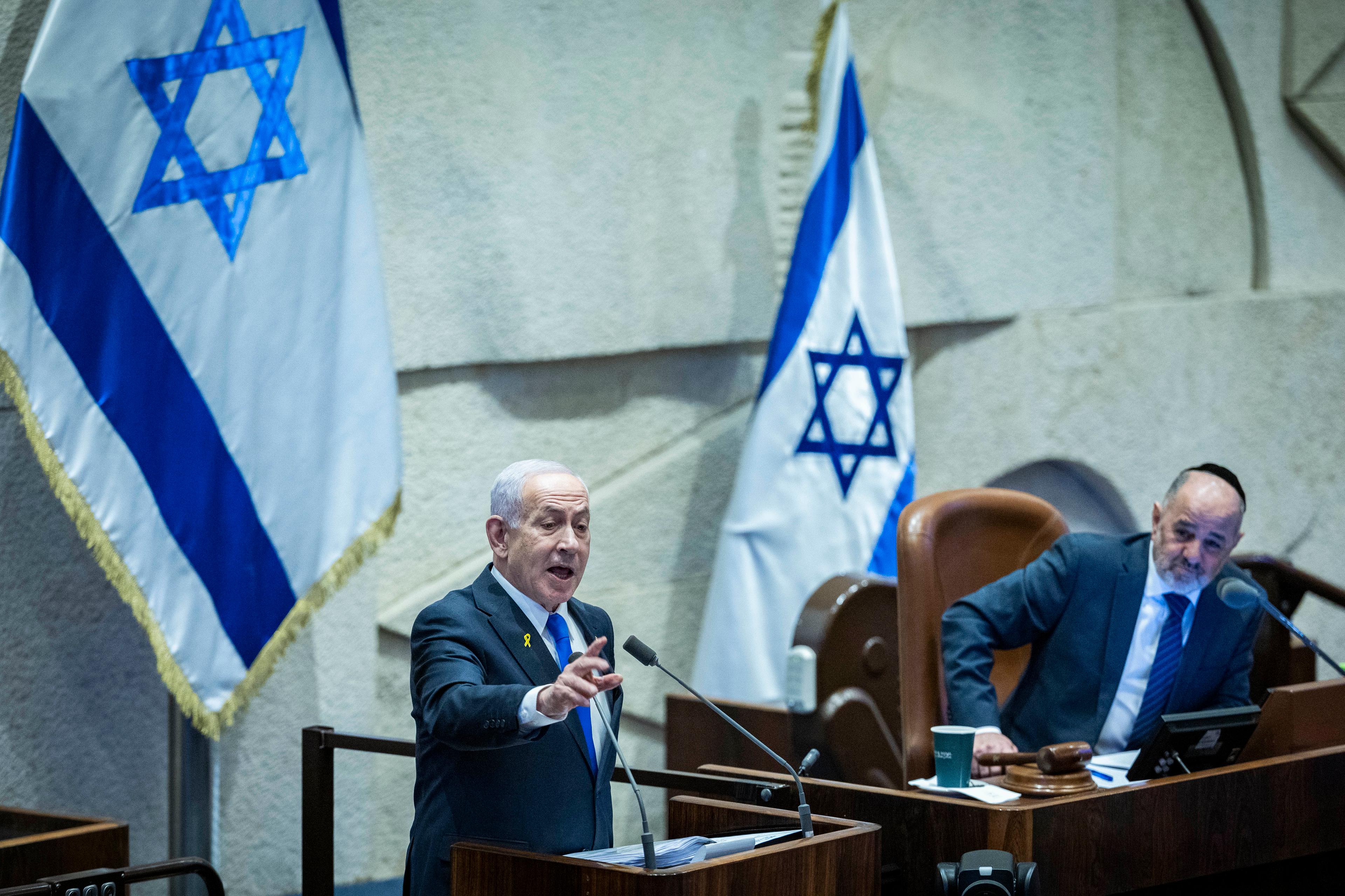 Israeli Prime Minister Benjamin Netanyahu at a 40 signatures debate, at the plenum hall of the Knesset, the Israeli parliament in Jerusalem, on December 8, 2025.