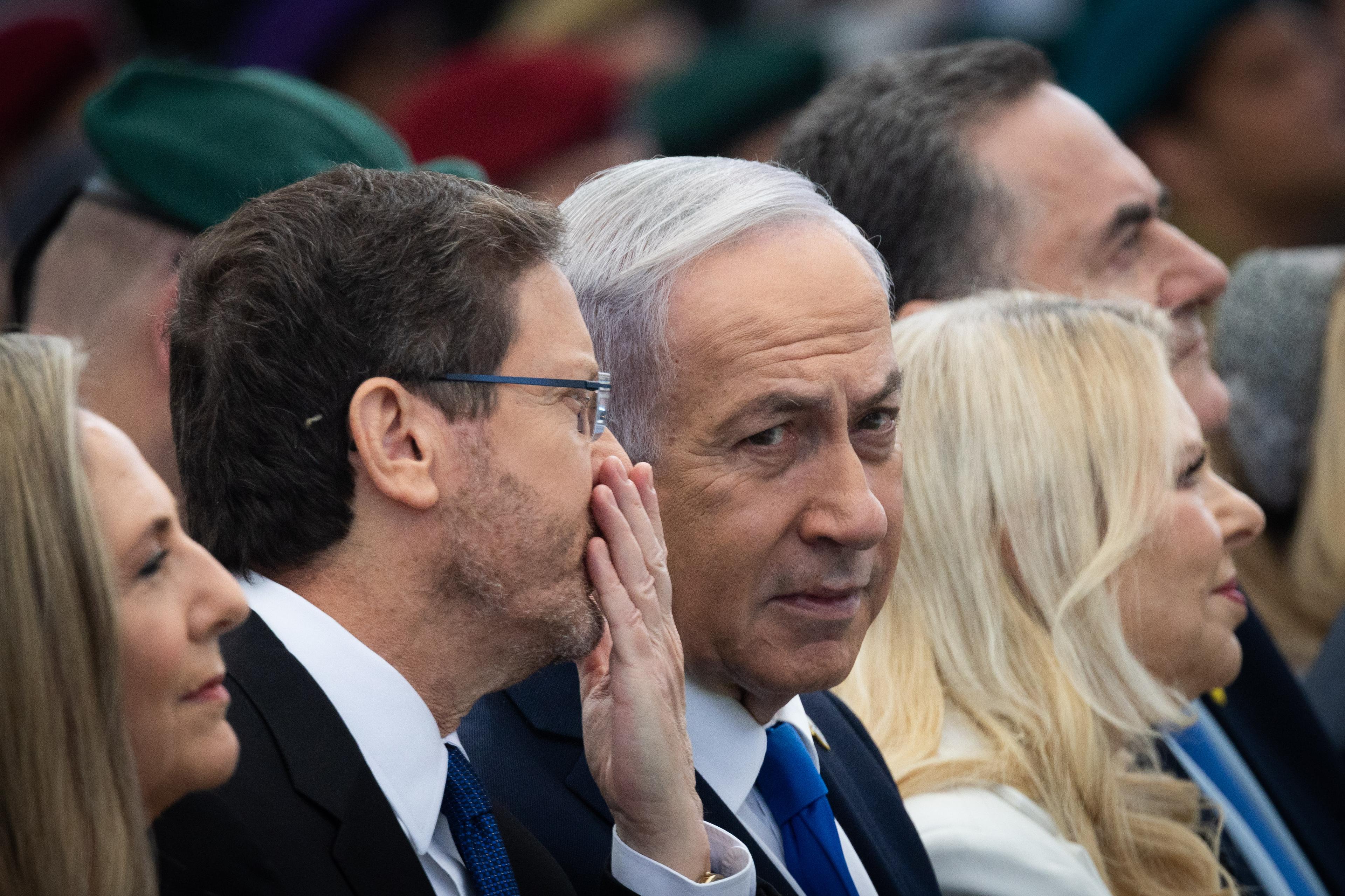 Israeli president Isaac Herzog, Israeli Prime Minister Benjamin Netanyahu and Minister of Defence Israeli Katz at event for outstanding soldiers as part of Israel's 77th Independence Day celebrations, at the President's residence in Jerusalem on May 1, 2025.