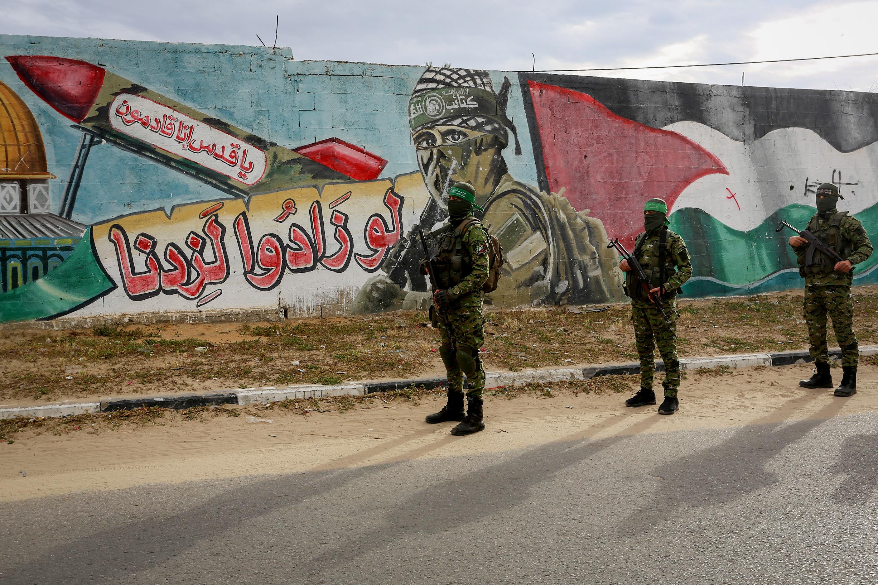 Palestinian members of Izz ad-Din al-Qassam Brigades, the armed wing of the Hamas movement seen during a patrol in Rafah, in the southern Gaza Strip on April 27, 2020.