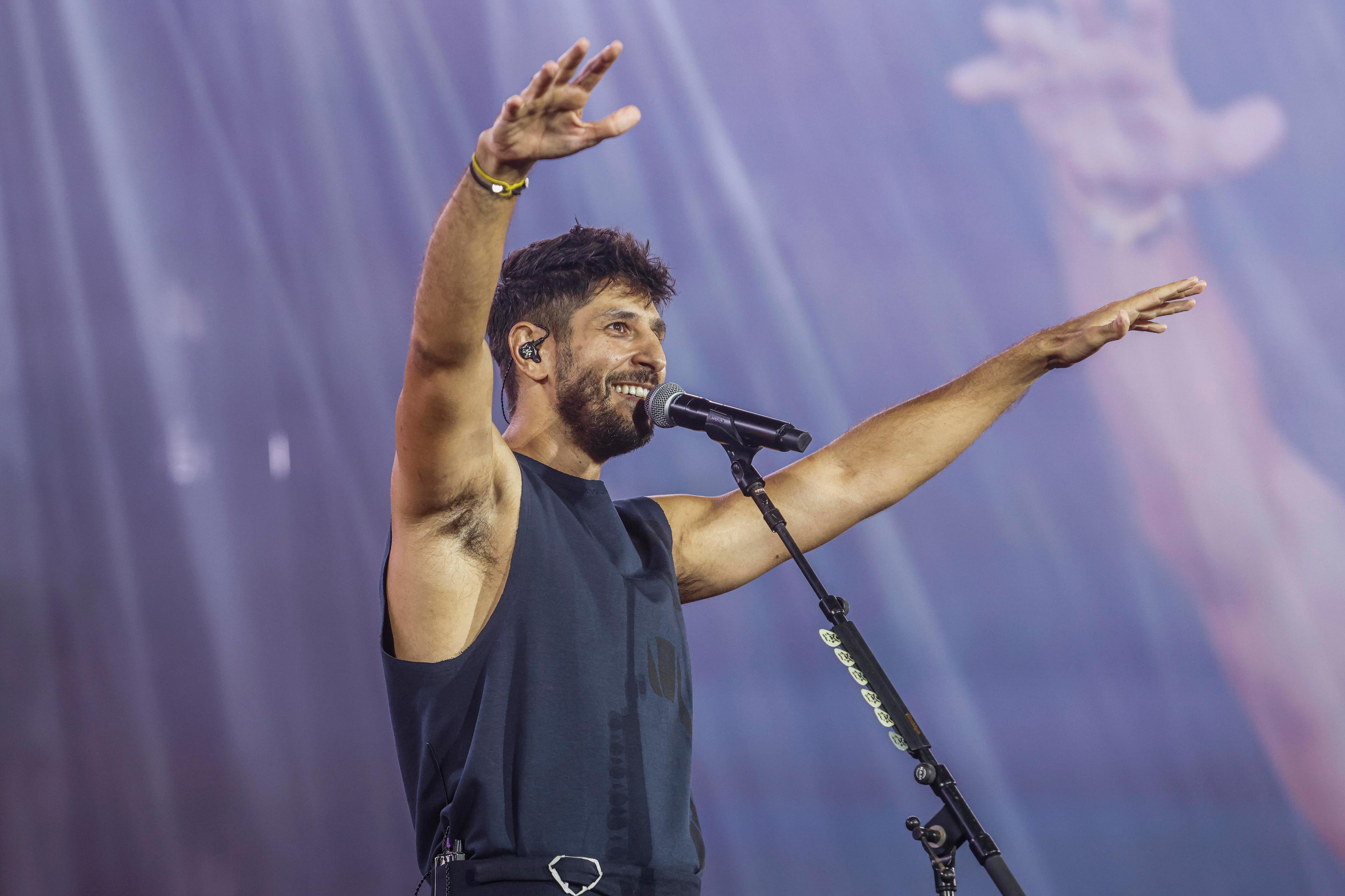 Israeli singer Idan Amedi performs live during a concert at Yarkon Park in Tel Aviv, September 9, 2025. 