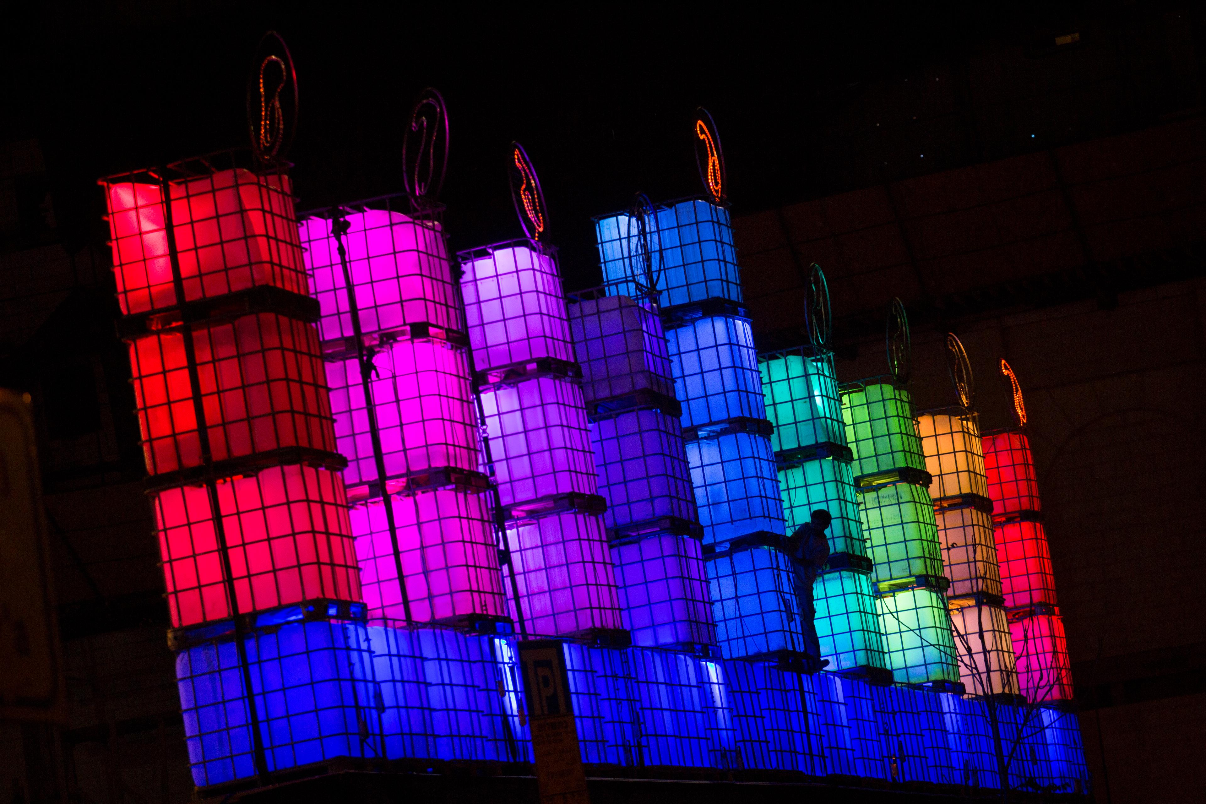 A large Hanukkia is lit in central Jerusalem, during the Jewish holiday of Hanukkah, on December 7, 2015. Hanukkah, also known as the Festival of Lights, is an eight-day Jewish holiday commemorating the rededication of the Holy Temple. The festival is observed by the kindling of the lights of a 'hanuckia'- a nine-branched candelabrum, with one additional light being lit on each night of the holiday.