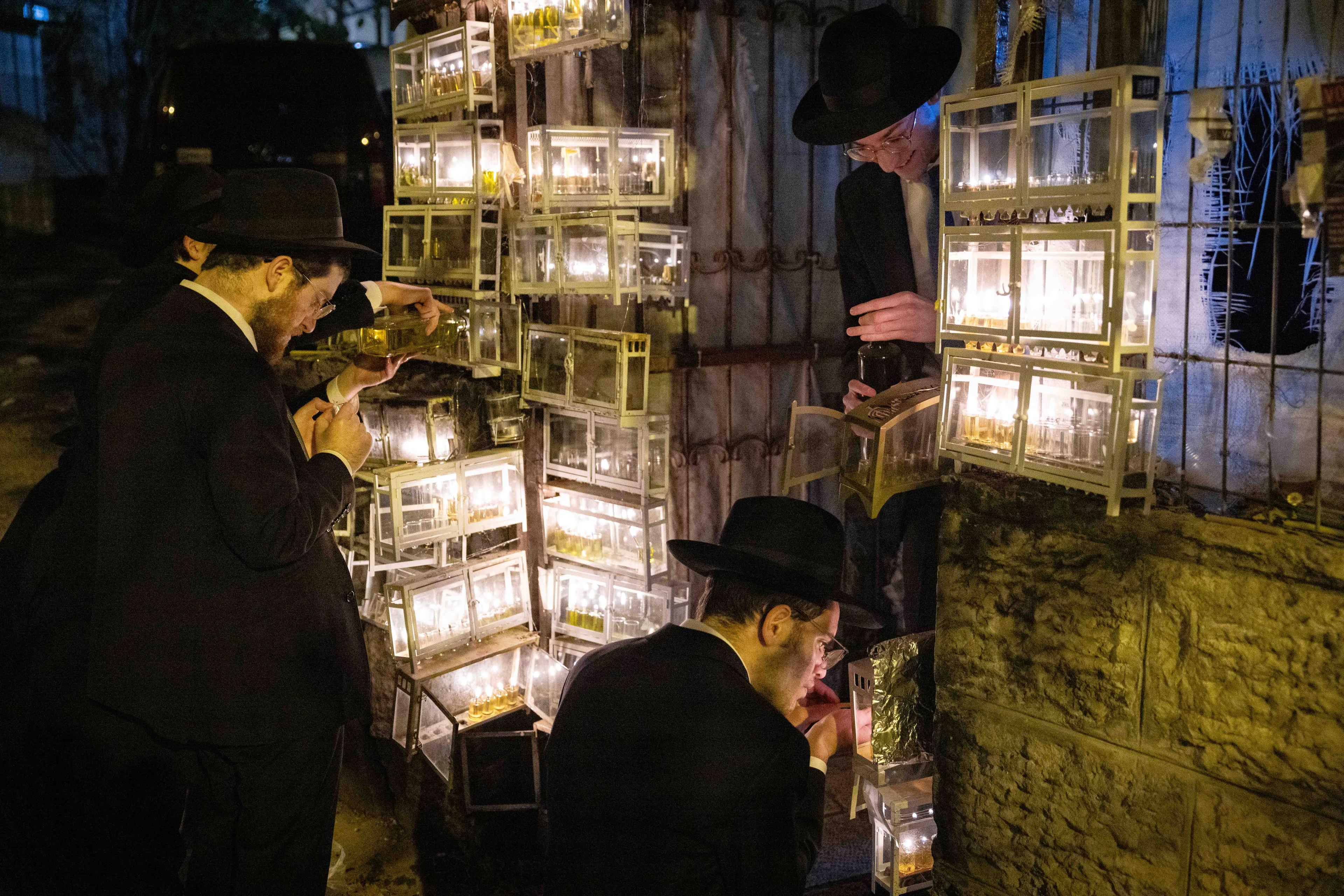 Lighting chanukah candles
