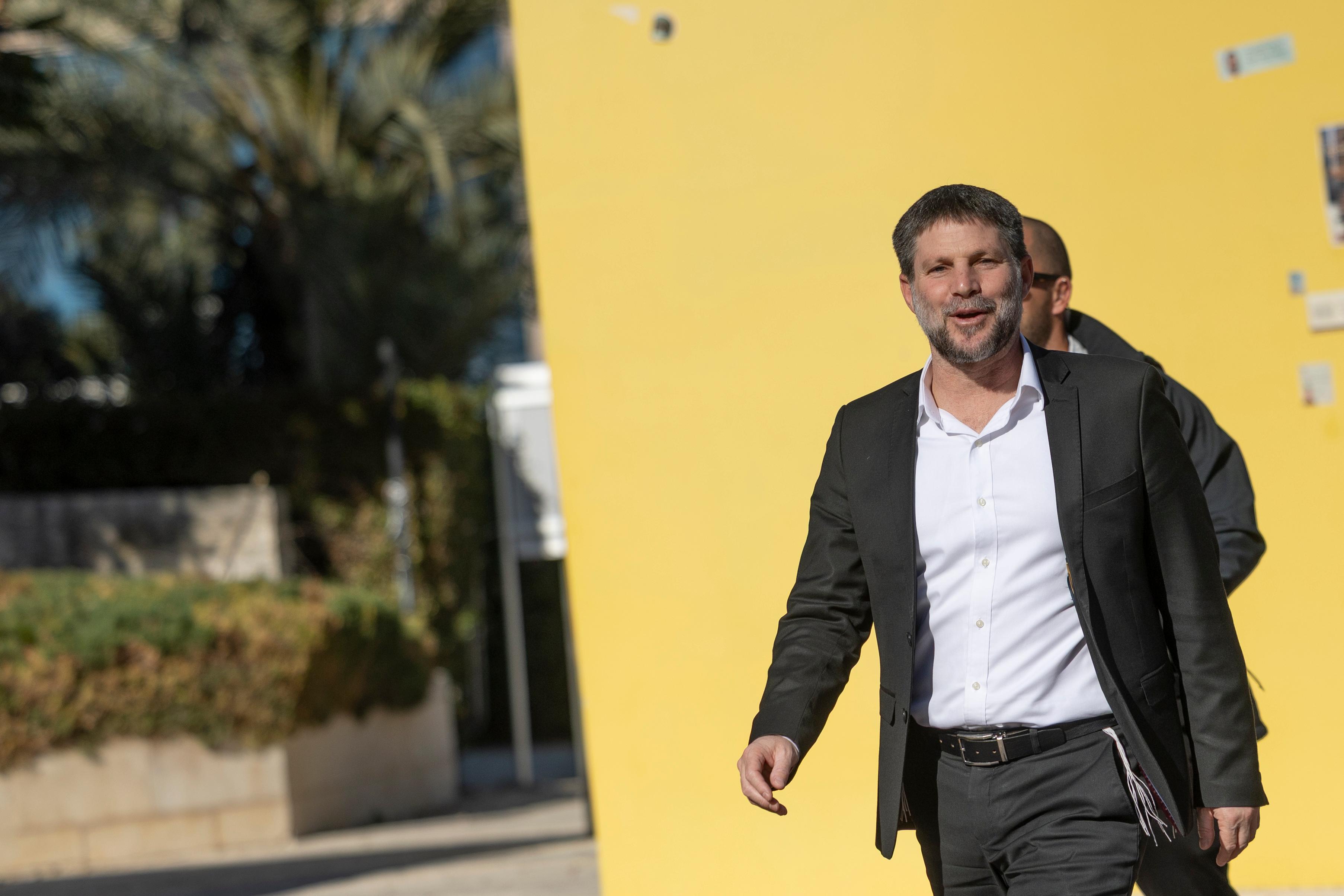 Israeli Finance Minister Bezalel Smotrich arrives to a conference of the Israeli newspaper Makor Rishon in Jerusalem, December 25, 2025.