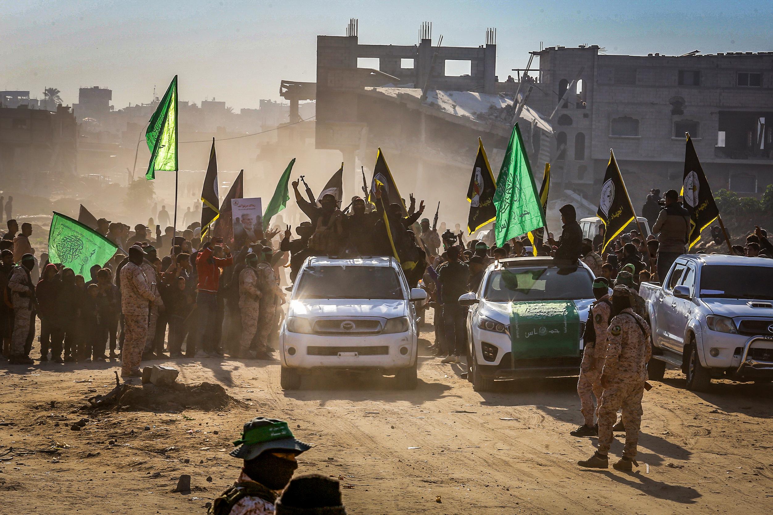 Hamas, Islamic Jihad and thousands of People outside the house of Sinwar in Khan Younis, where two Israeli hostages and 5 Thai hostages were released to the Red Cross as part of a deal between Israel and Hamas, January 30, 2025.