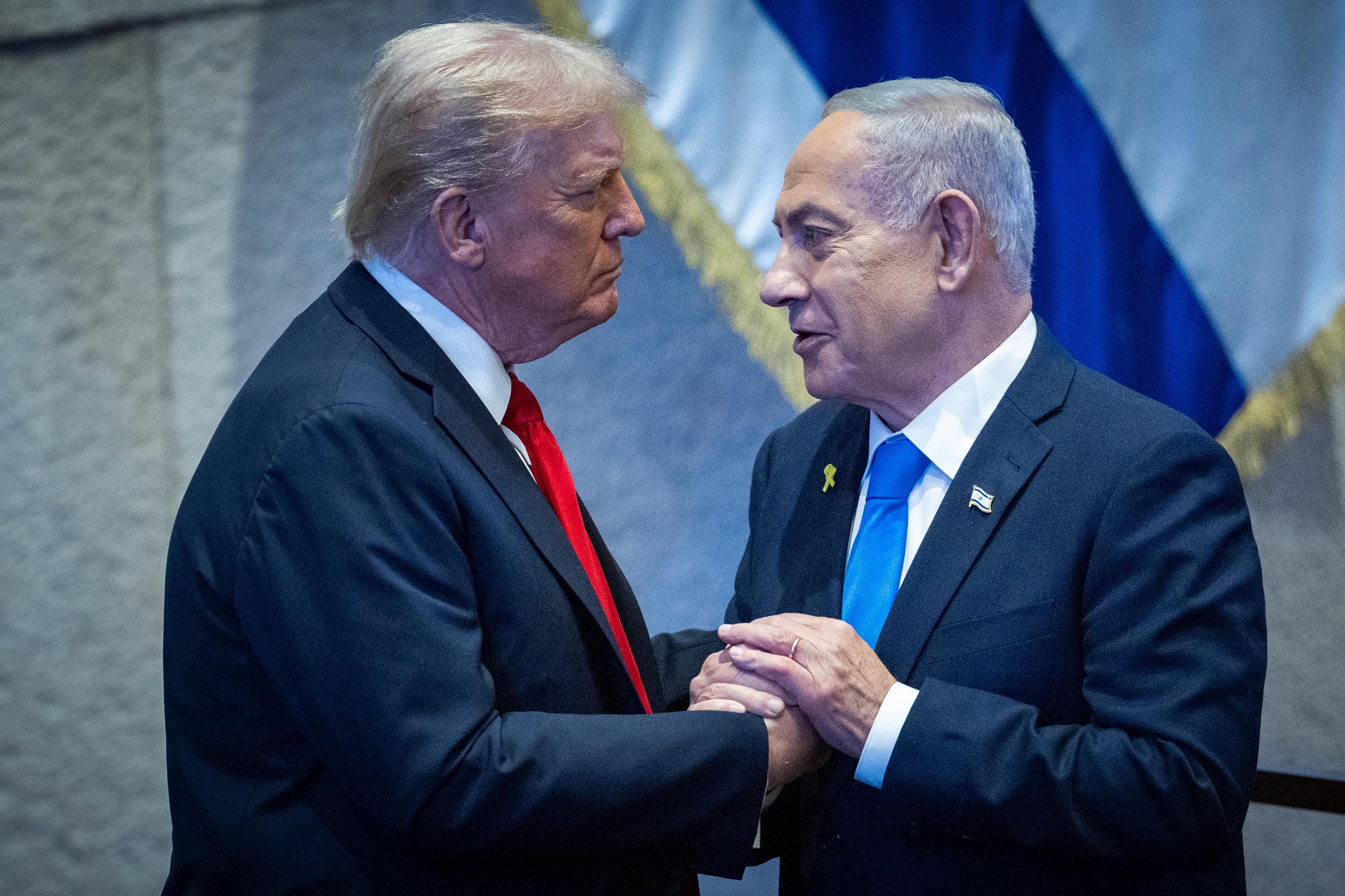 U.S. President Donald Trump with Israeli Prime Minister Benjamin Netanyahu during a special plenum session in honor of President Trump at the Knesset, Israel’s parliament in Jerusalem, on October 13, 2025.