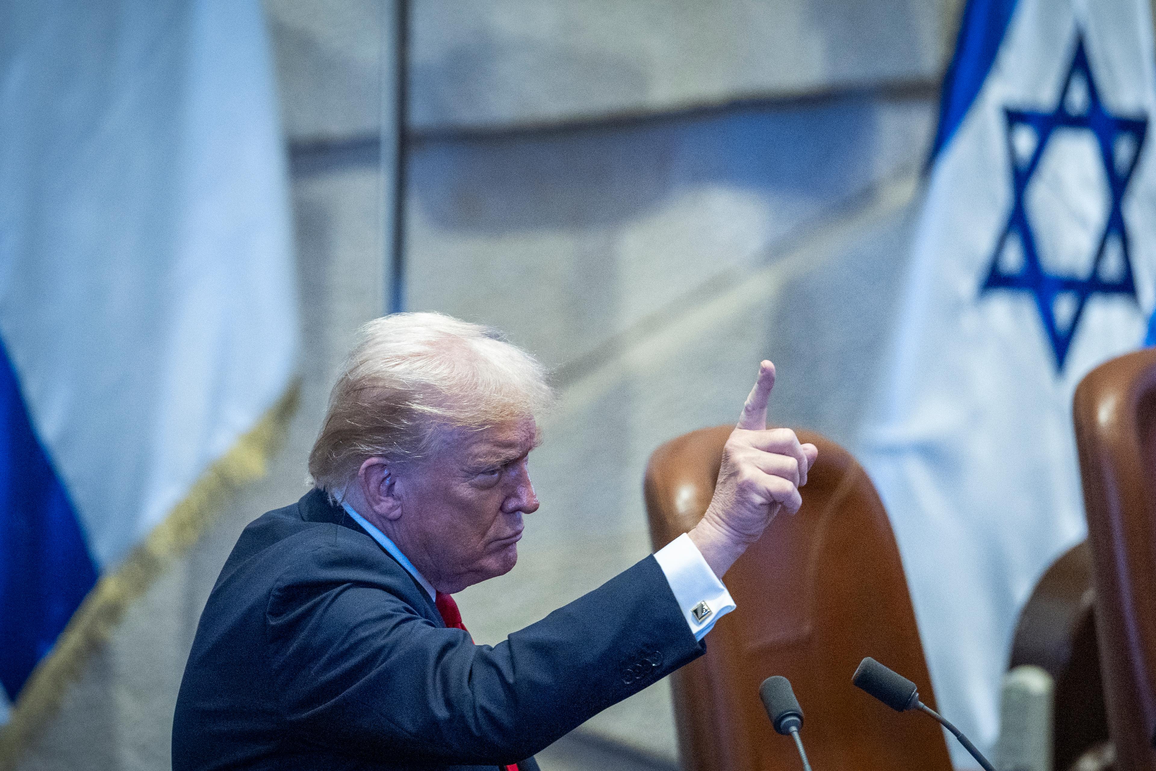 U.S. President Donald Trump speaks during a special plenum session held in his honor at the Knesset, Israel’s parliament in Jerusalem, on October 13, 2025.