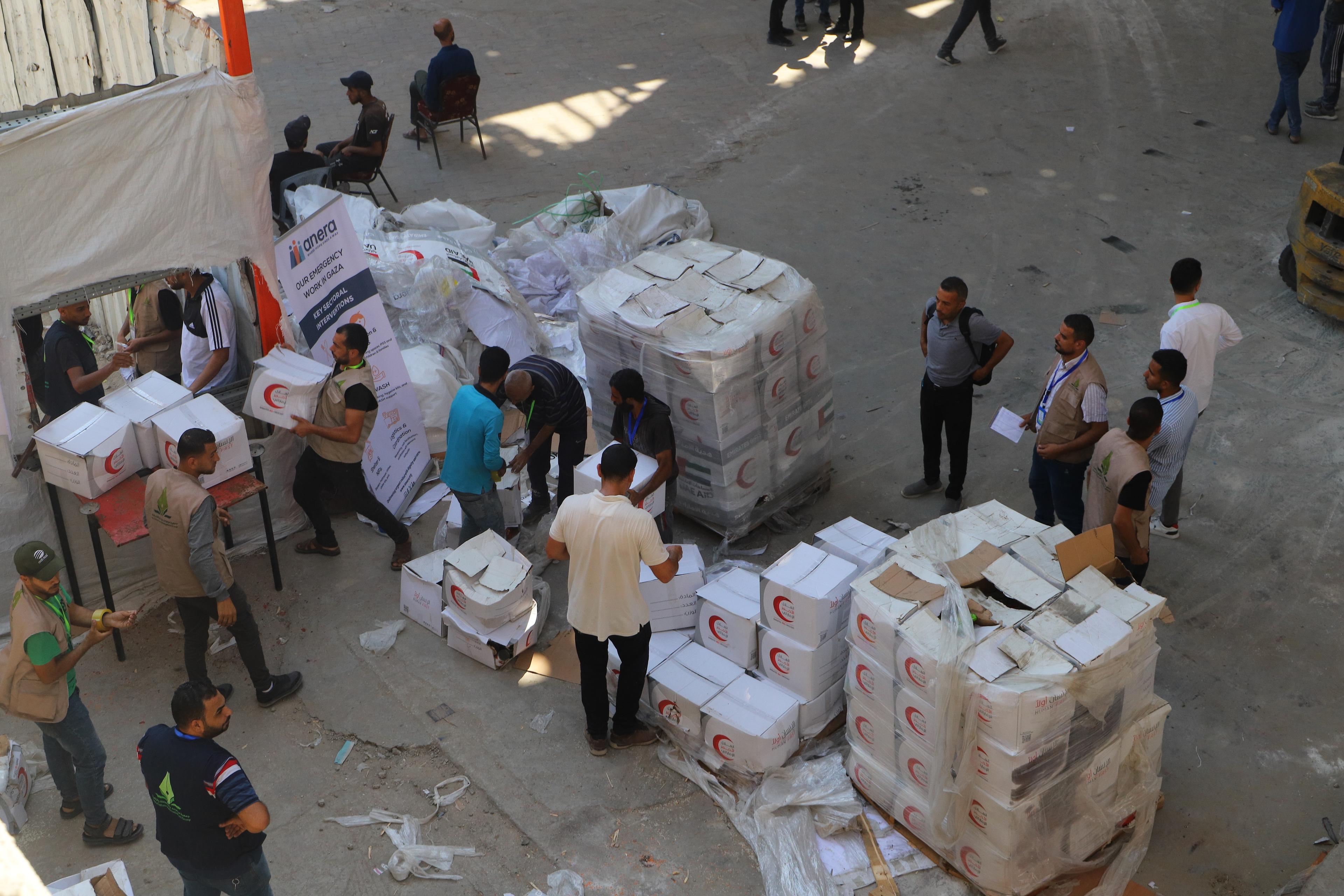 Humanitarian aid is distributed to Palestinians in the northern Gaza Strip, June 26, 2025.