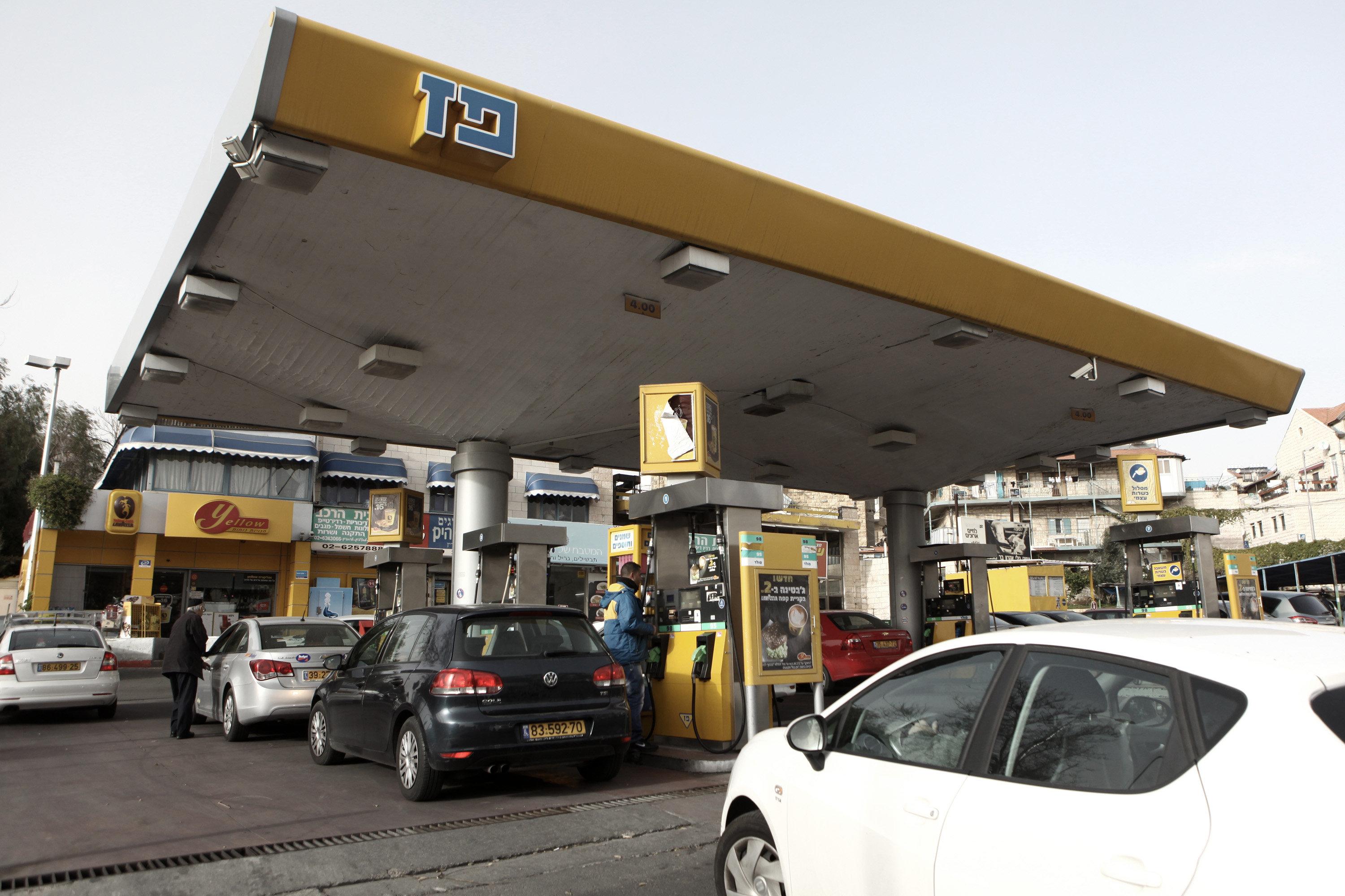 Drivers are waiting to fill benzene at a gas station in Jerusalem before petrol prices rise on 28 Feb 2012. Israel has some of the highest prices in the world for gasoline, with a liter of 95 octane priced at approximately 8 Shekels, or about 2.5 US dollars.