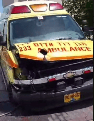 Ambulance damaged in Hezbollah rocket barrage.