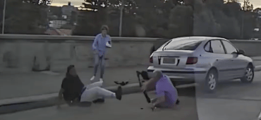 Boris and Sofia Gurman attempting to stop terrorist Sajid Akram as he emerges to begin shooting.