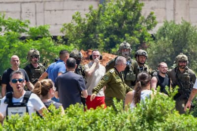 Released hostages Andrey Kozlov, Almog Meir and Shlomi Ziv arrive at the Sheba Medical Center in Ramat Gan, June 8, 2024. 