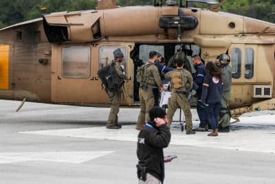 A Military helicopter evacuates injured people from the Ziv Medical center in Tzfat, after being injured from a missile fired by Hezbollah. February 14, 2024.