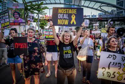 Demonstrators protest calling for the release of Israeli hostages held in the Gaza Strip outside Hakirya Base in Tel Aviv, July 3, 2024. Photo by Avshalom Sassoni/Flash90