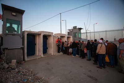 Israeli security forces guard the Qalandia checkpoint near the West Bank city of Ramallah