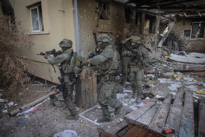 Members of the tactical unit of the Yamas patrol in Kibbutz Be'eri, near the Israeli-Gaza border, southern Israel. October 22, 2023. 