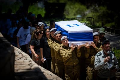 Family and friends of Israeli soldier Sgt. Maj. (res.) Eliran MIzrahi attend his funeral at the Mount Herzl Military Cemetery