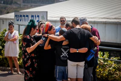 Family and friends attend the funeral of Yonatan Deutsch, at Har HaMenuchot Cemetery in Jerusalem, August 12, 2024.